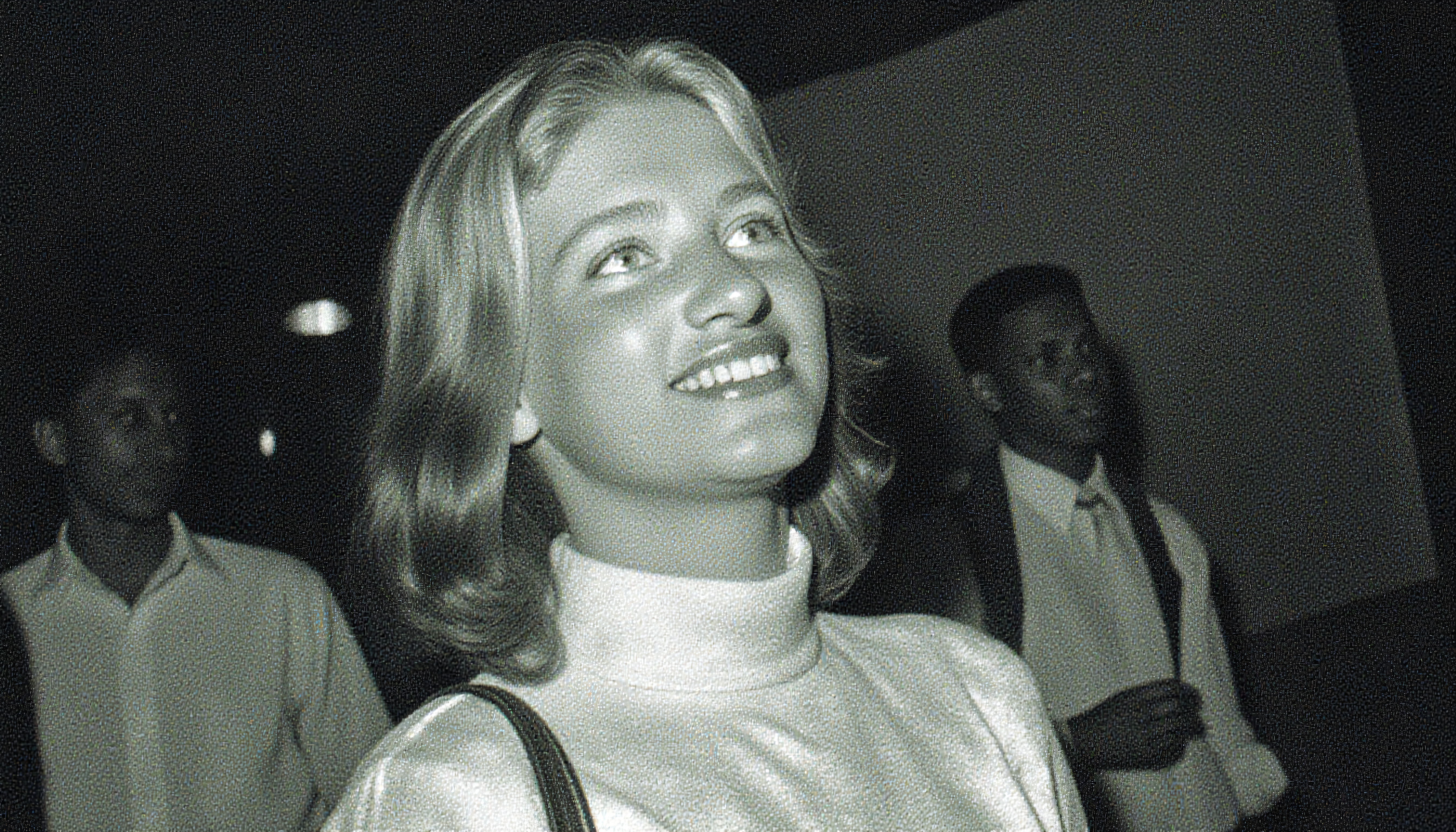 Vintage Black and White Portrait of Smiling Woman with Shoulder-Length Hair