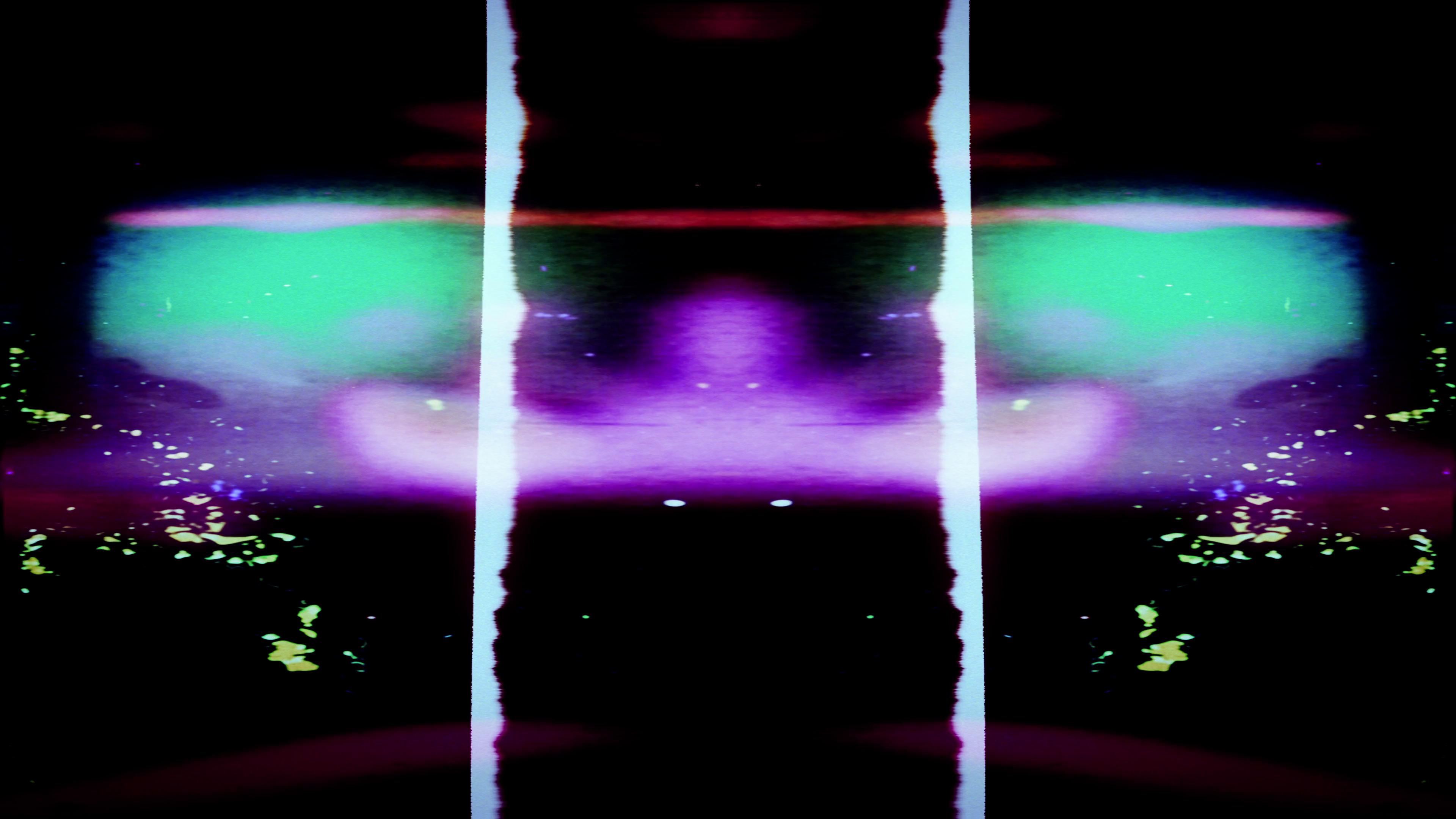 Surreal cosmic glitch 4K video loop featuring vibrant color explosions and mirrored distortions