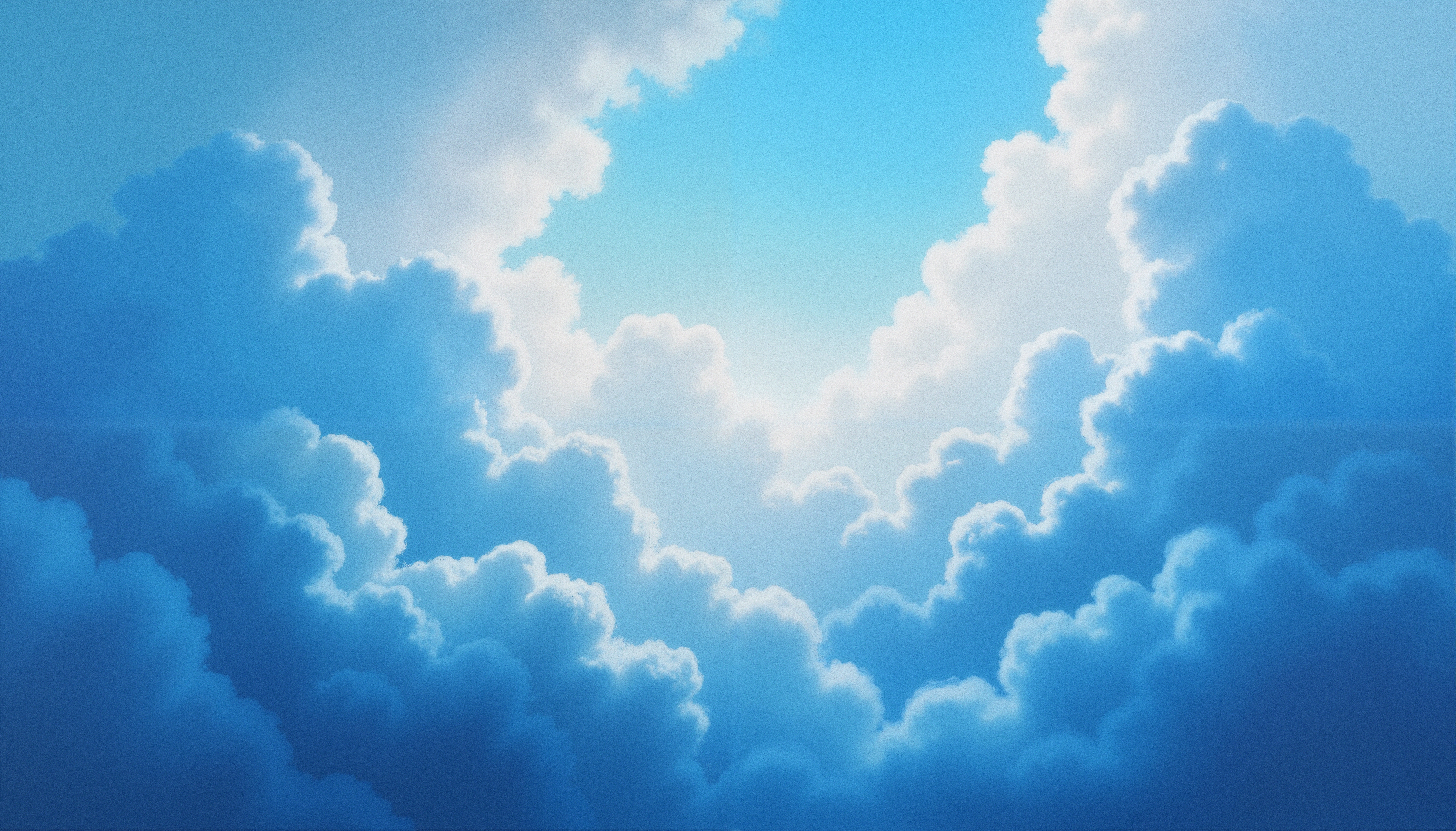 A serene sky filled with soft, fluffy clouds and vibrant blue patches creates a tranquil and uplifting scene.