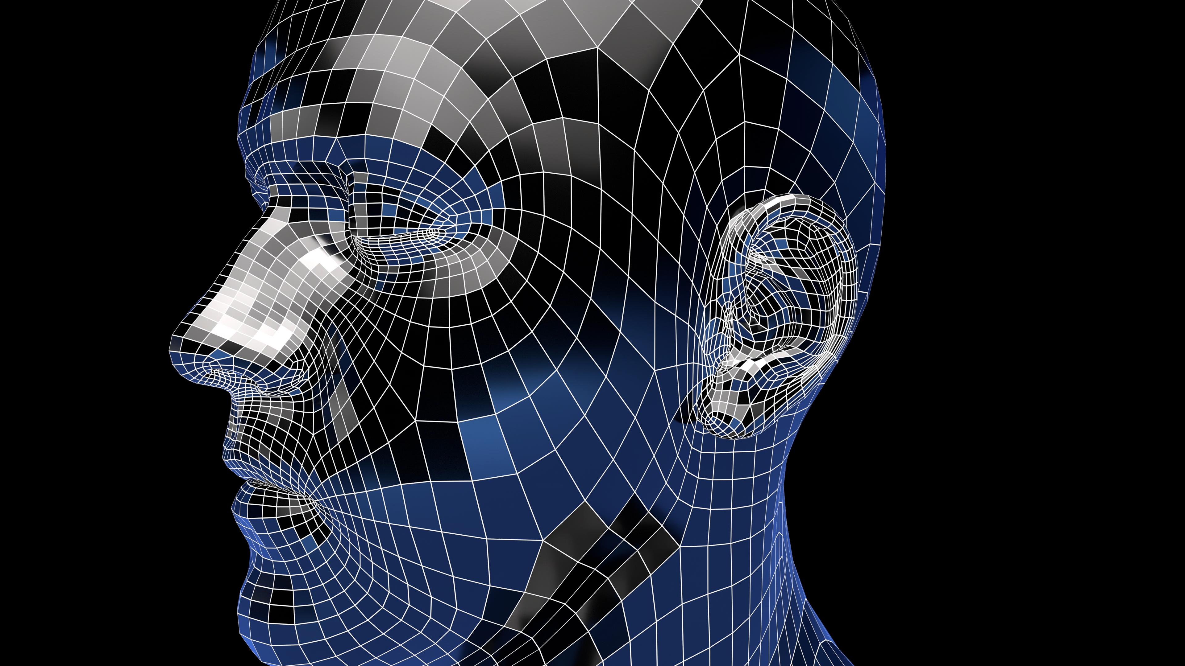 4K video loop of a wireframe human head rotating digitally against dark video backdrop.