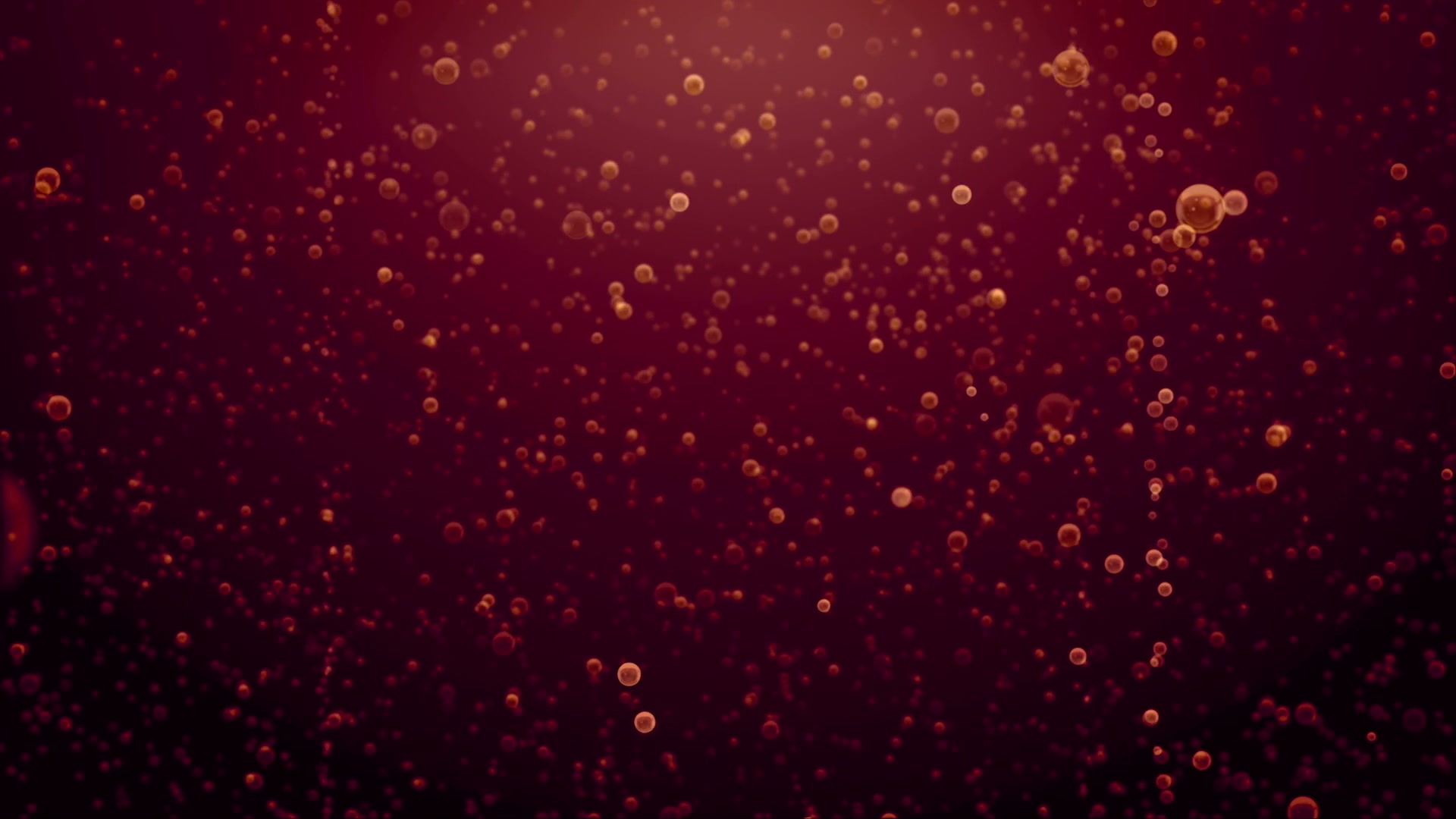 Abstract video loop featuring glowing red bubbles rising against a dark background, creating a dynamic and fluid pattern with a warm and vibrant atmosphere.