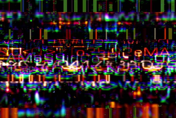 Vibrant digital glitch art video loop featuring colorful neon hues and fragmented text with chaotic overlapping patterns and pixelated sections.
