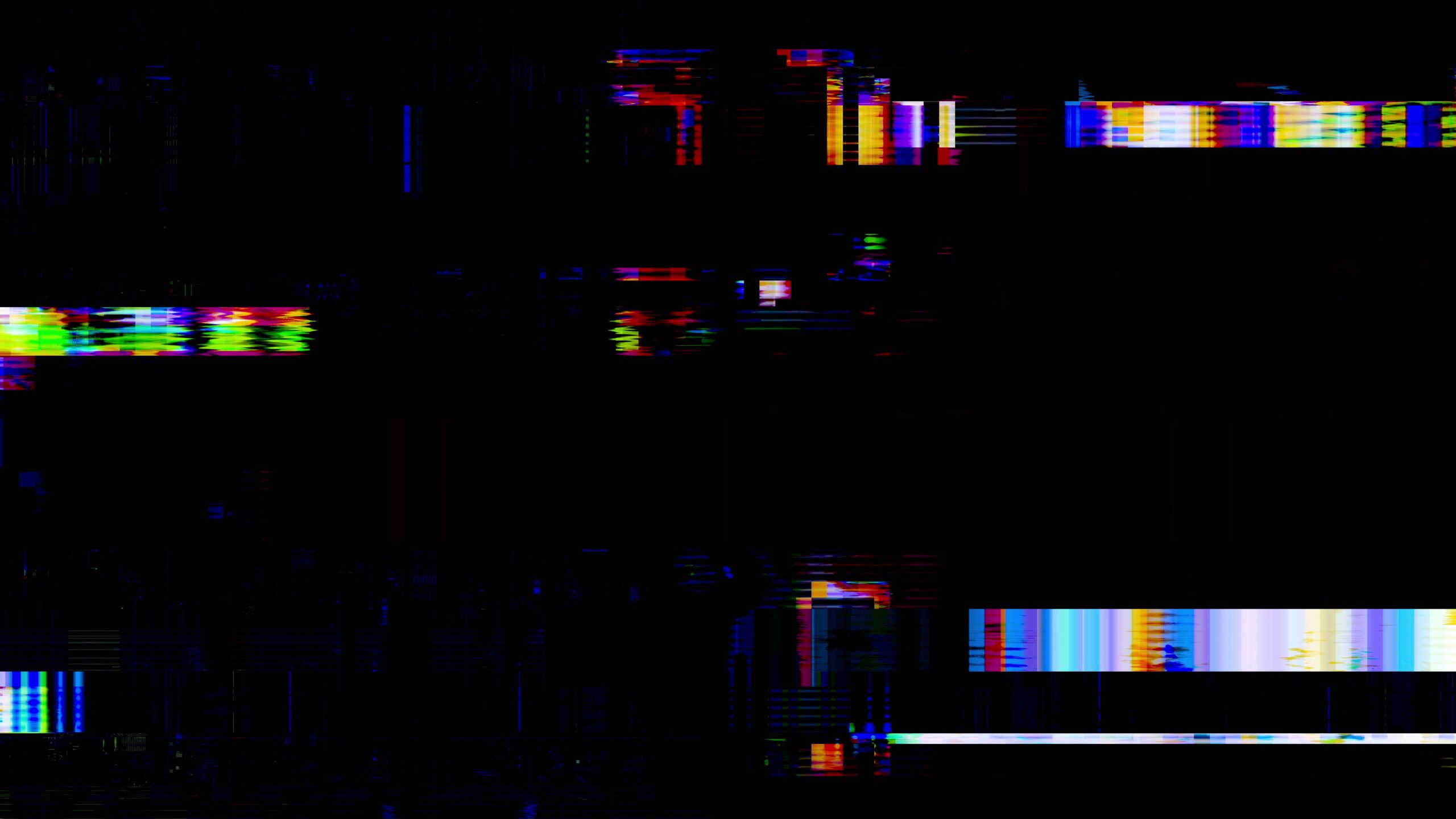 Colorful glitch effects on a digital screen with vivid abstract patterns.