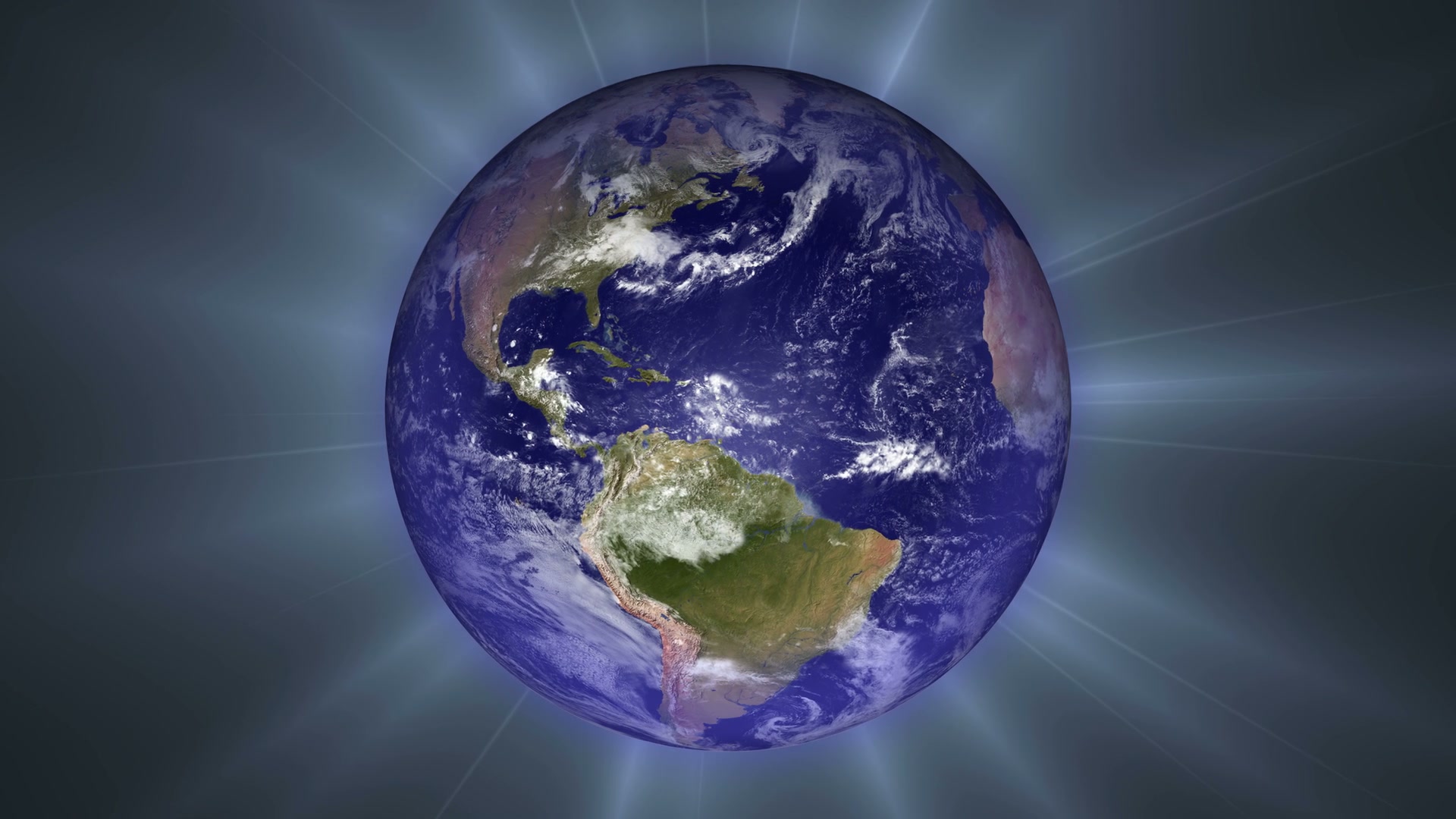 Video loop of a rotating Earth taken from space, with realistic cloud formations and vibrant colors, against a dark background with radiant light beams.