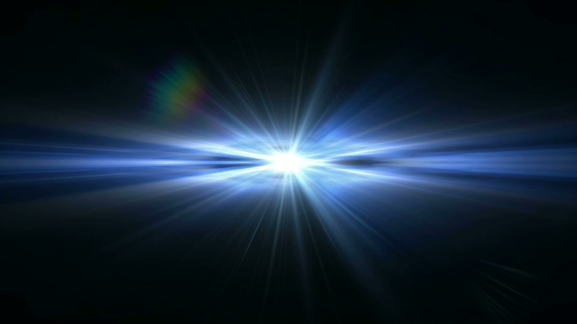 A stunning looping video of a bright, blue-white burst of light radiating symmetrically from the center against a dark background, with a subtle rainbow flare on the upper left.