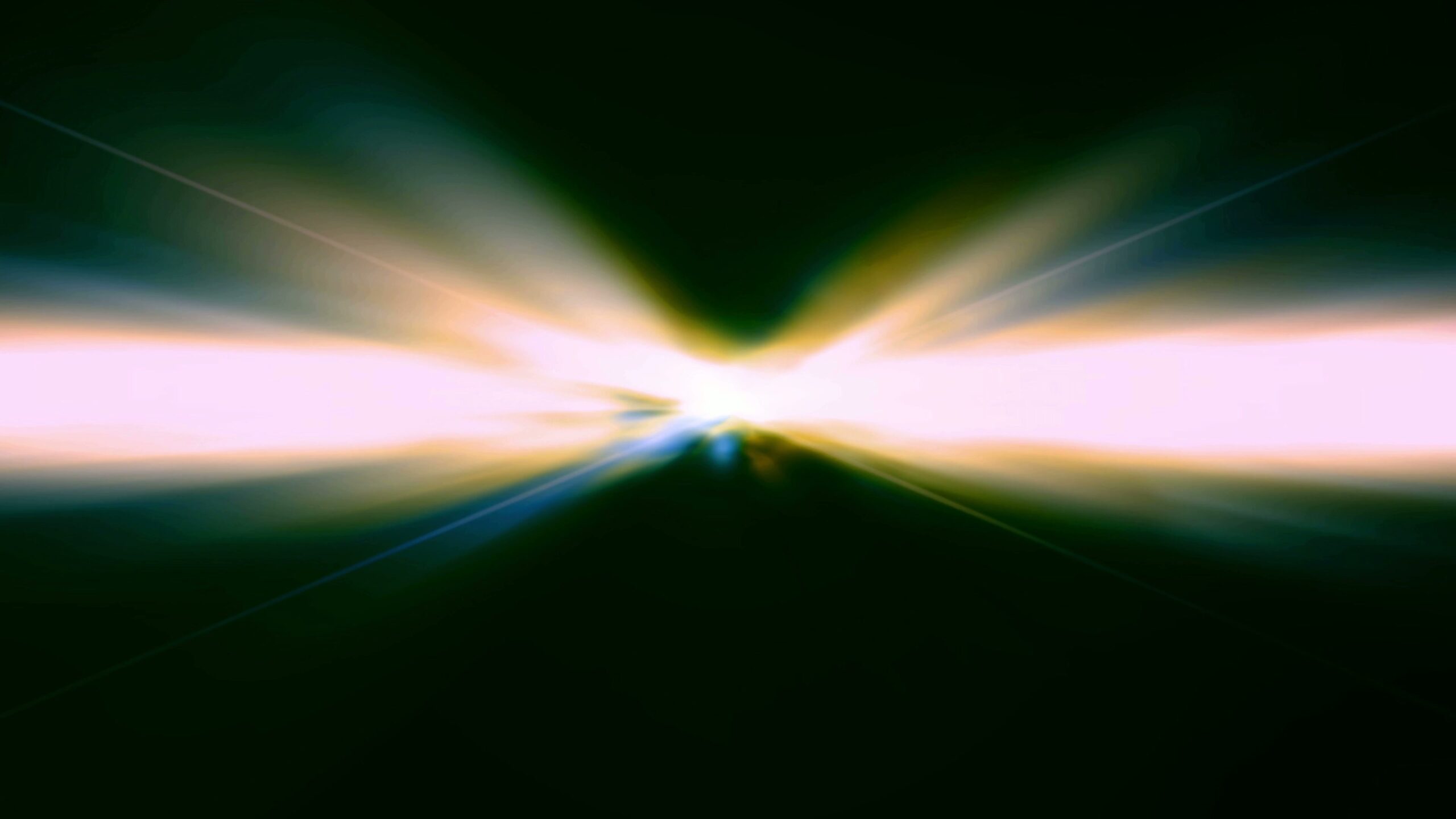 Dynamic abstract light patterns resembling high-speed space travel, with radiating colored light rays on a dark video background.