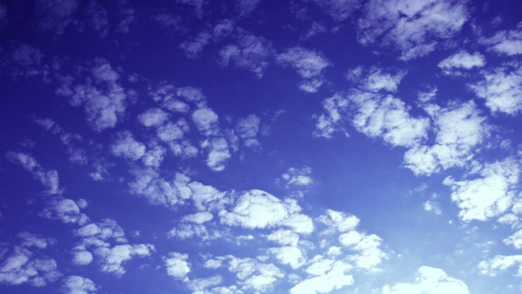 The video captures a serene and expansive view of the time-lapse sky in motion.