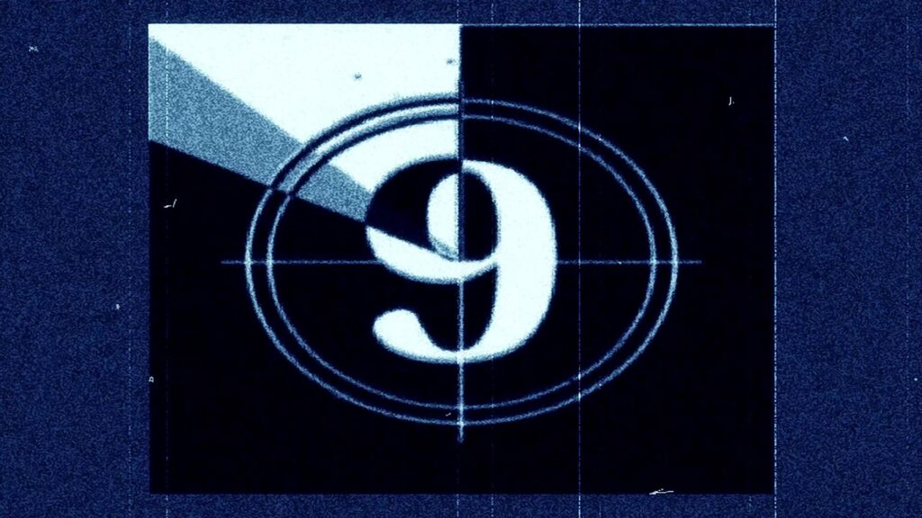 Retro film countdown with number transition from nine to three.