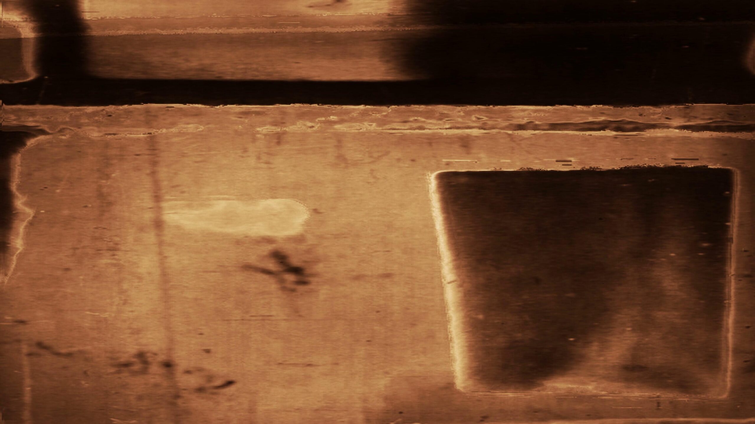The 4K video loop presents a nostalgic and vintage aesthetic with sepia-toned imagery that evokes an old film reel.