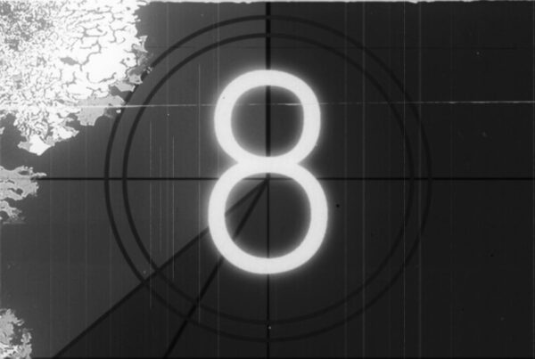 Black-and-white 16mm countdown numbers with target rings and distressed edges.