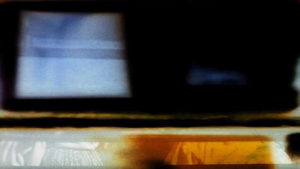 Free HD video loop of vintage 16mm film leader with eerie glowing lines