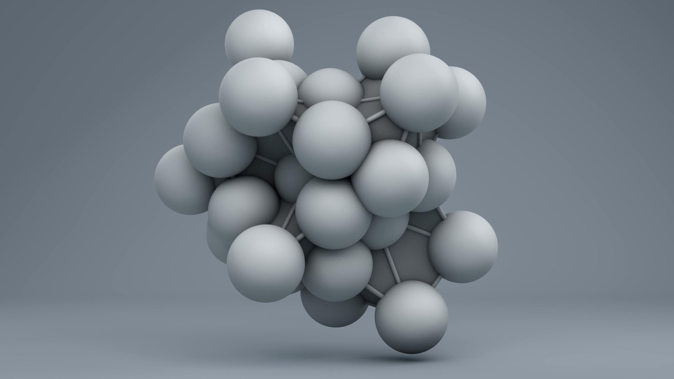 4K video loop shows a 3D model of interconnected gray spheres representing a molecular structure on a gradient gray background.