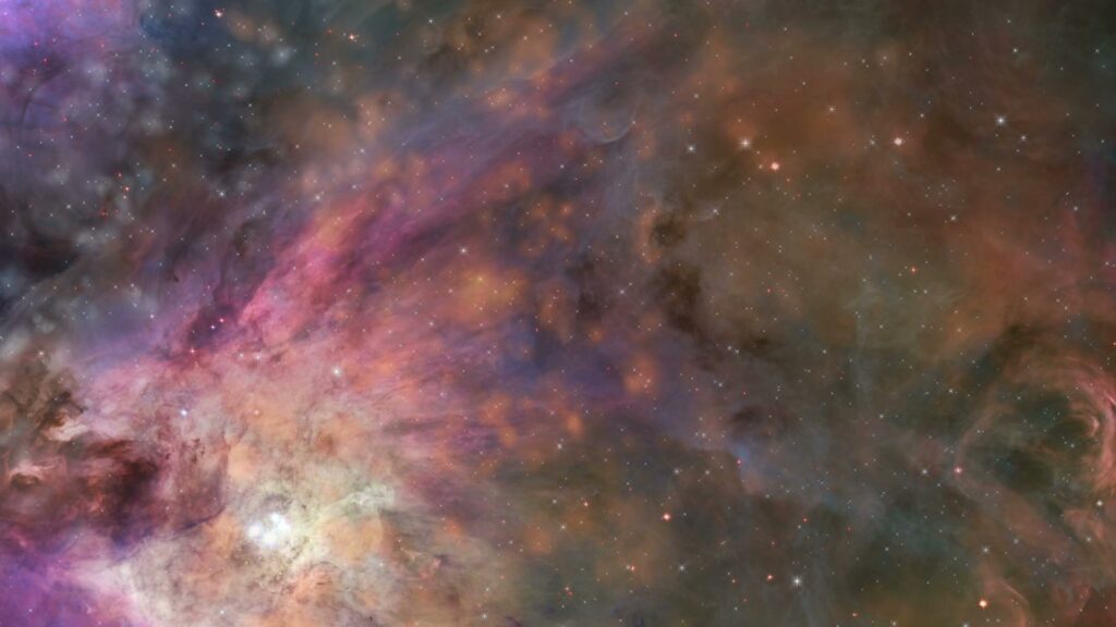 A mesmerizing video of a nebula with colorful swirling clouds of gas and interstellar dust, highlighted by twinkling stars and ethereal galactic patterns in the cosmos.