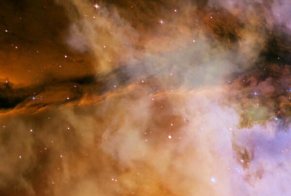 4K video of a cosmic journey with swirling nebulae in hues of amber, violet, and deep indigo, evoking both awe and mystery.