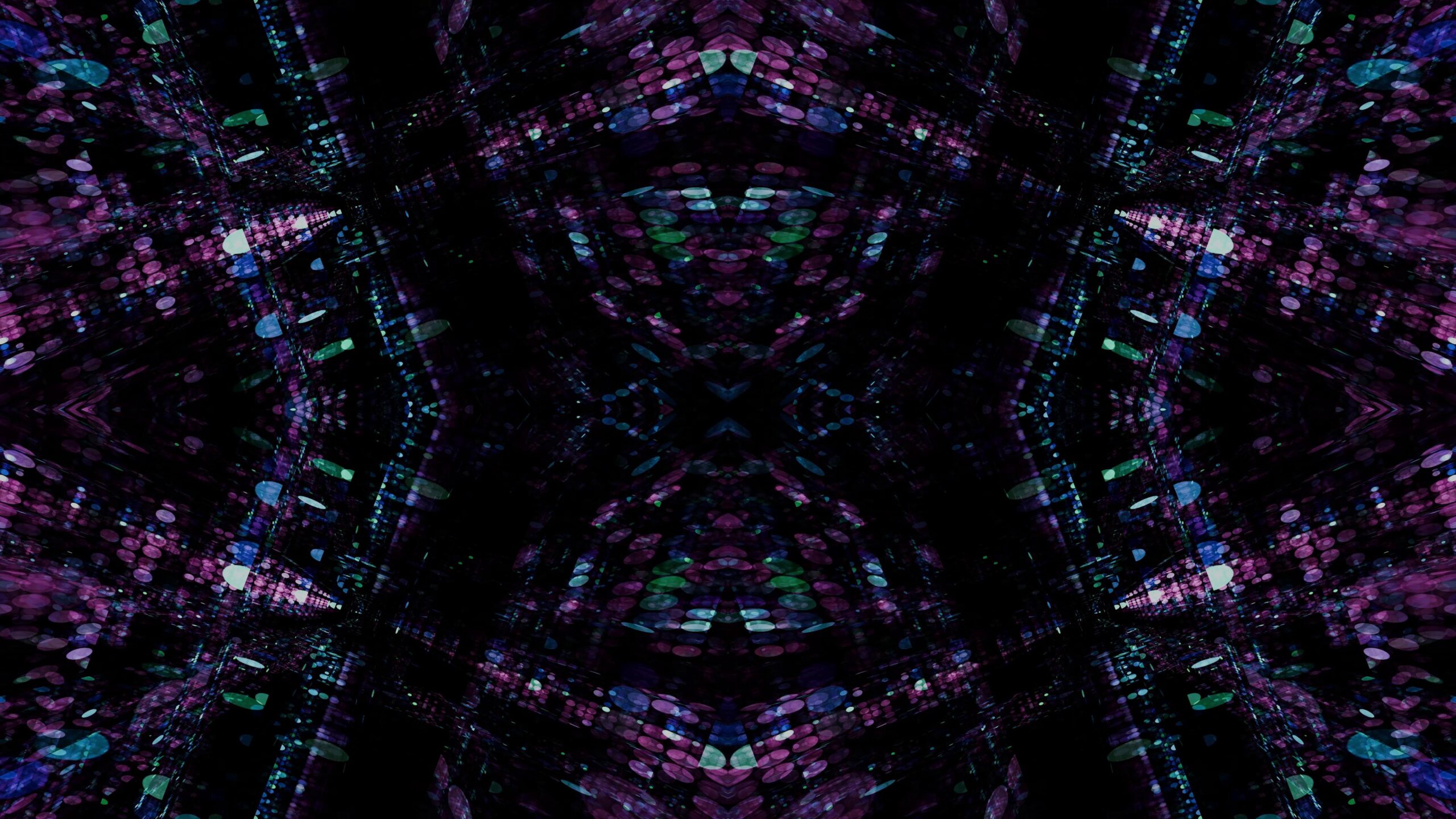 Abstract geometric patterned digital artwork featuring floating spheres and neon streaks rotating symmetrically over dark background.