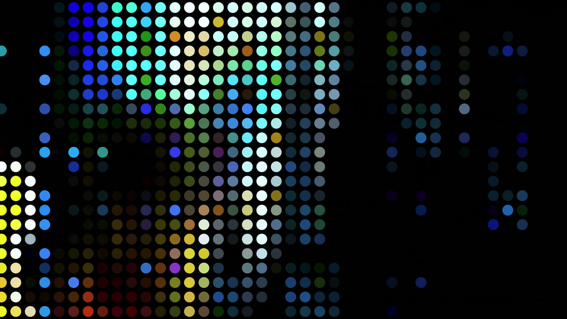 Abstract HD video loop featuring a grid of colorful dots against a black background, creating a vibrant and dynamic pattern reminiscent of digital art or pointillism.