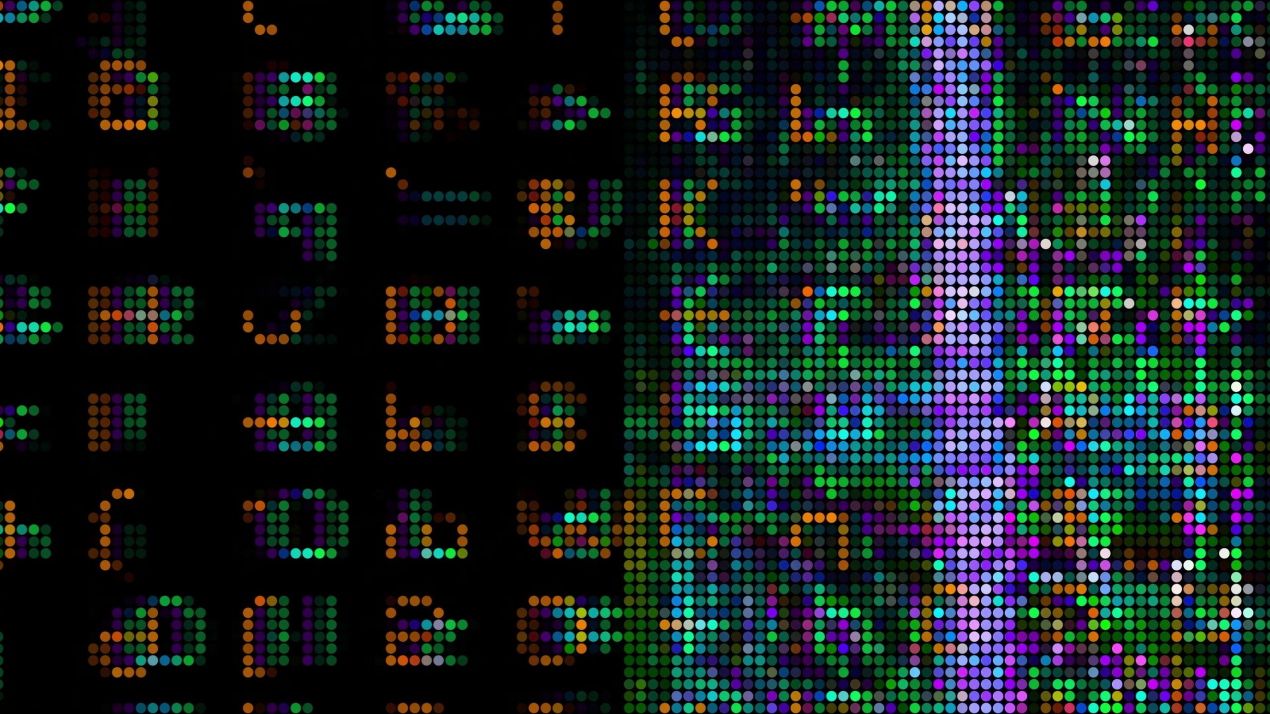 Colorful dotted digital 4K video loop featuring illuminated dots in pink, purple, and orange shades against a dark background.