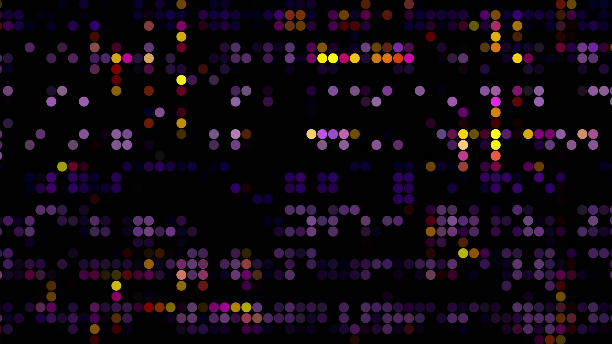 Abstract patterns with colorful dots on a black video background.