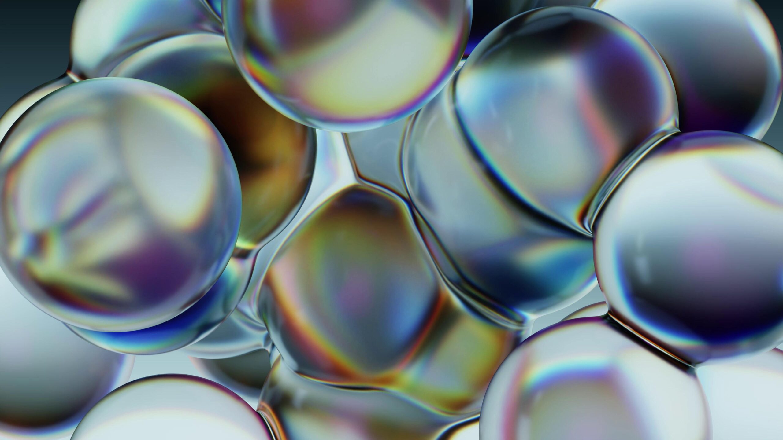 4K video loop close-up of iridescent colorful bubbles.