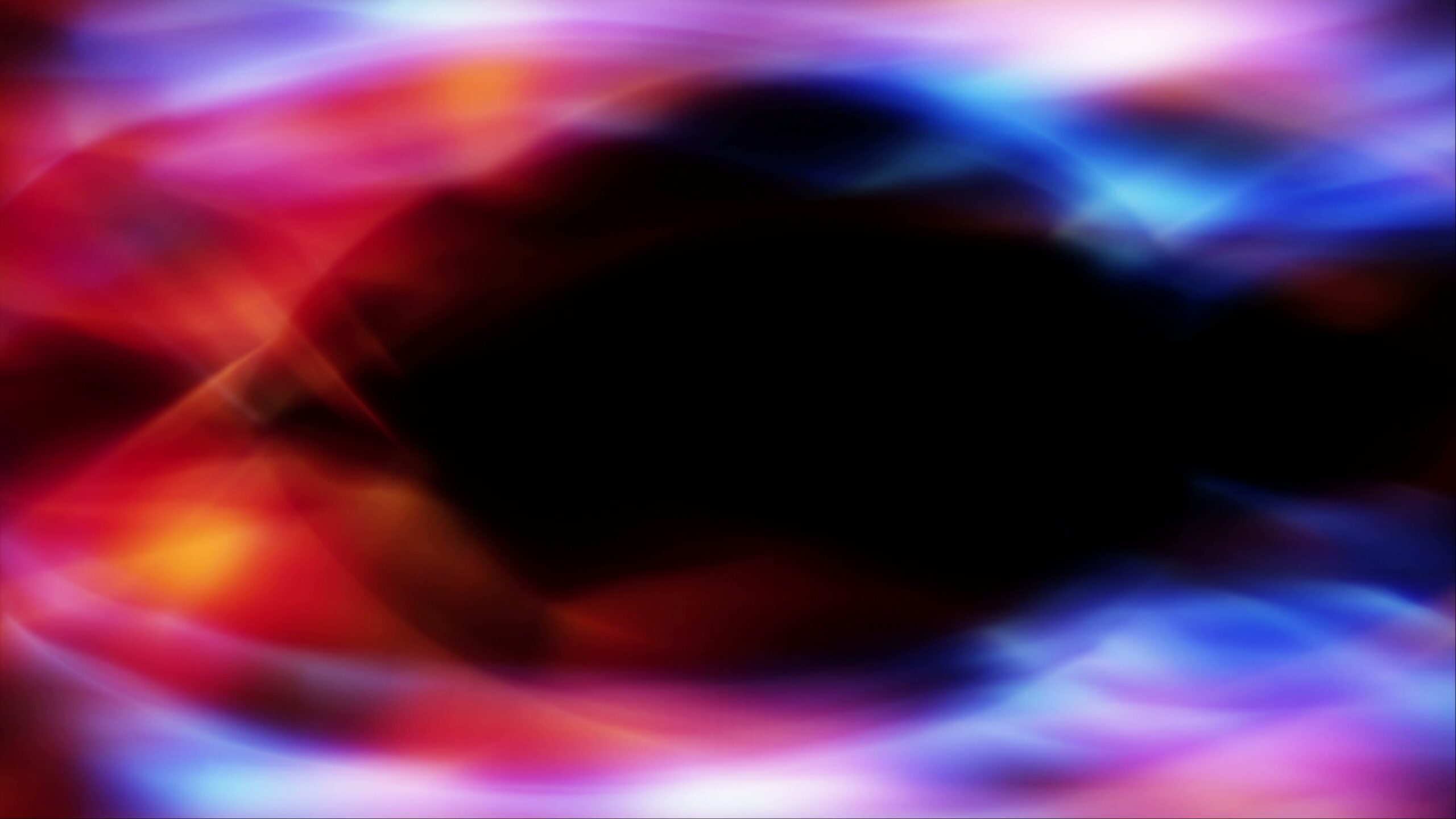 Abstract video background loop of mesmerizing light swirls with vibrant colors and dark center.