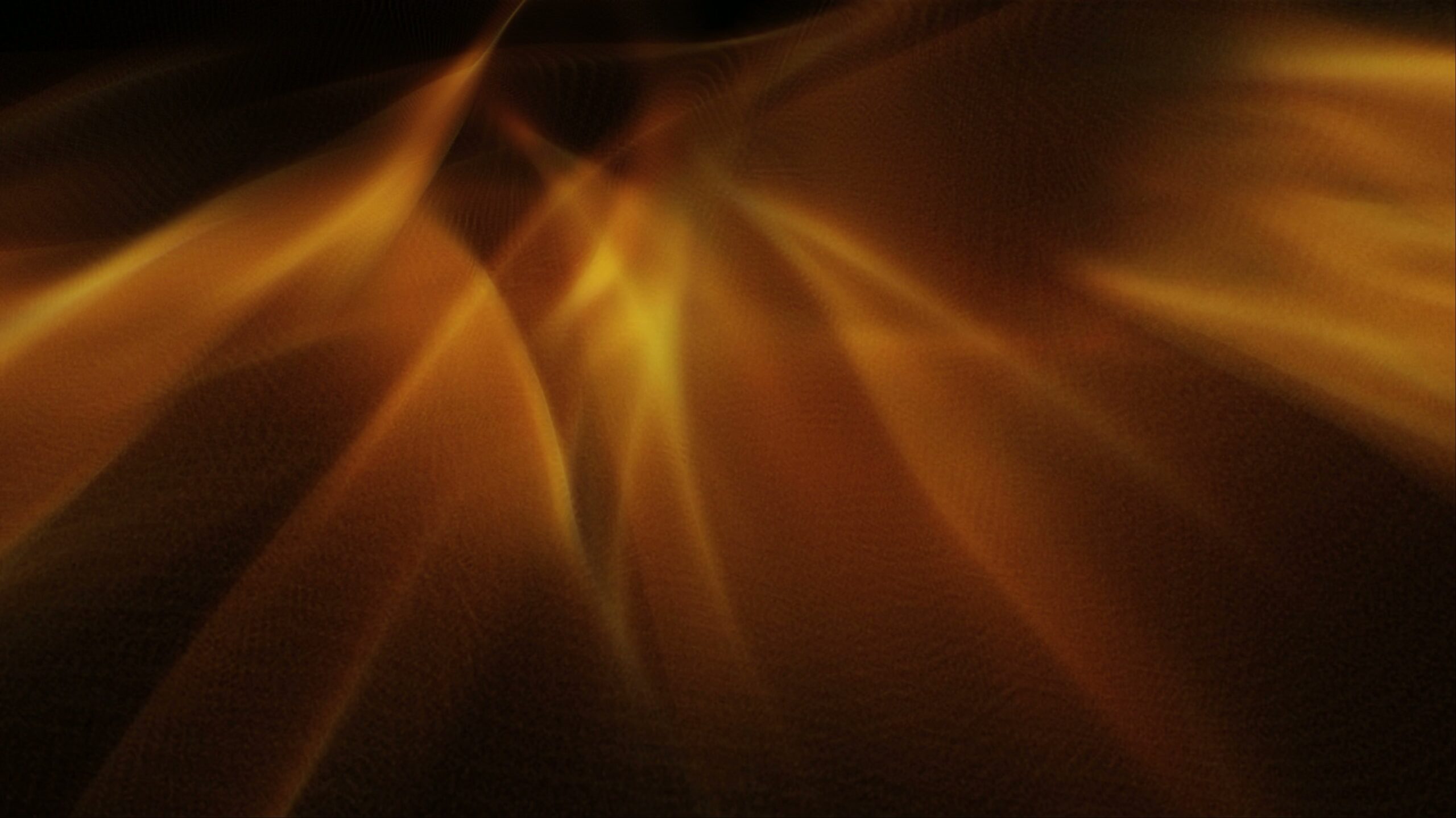4K video loop of golden abstract light patterns flowing dynamically across the screen, evoking warmth and fluidity.