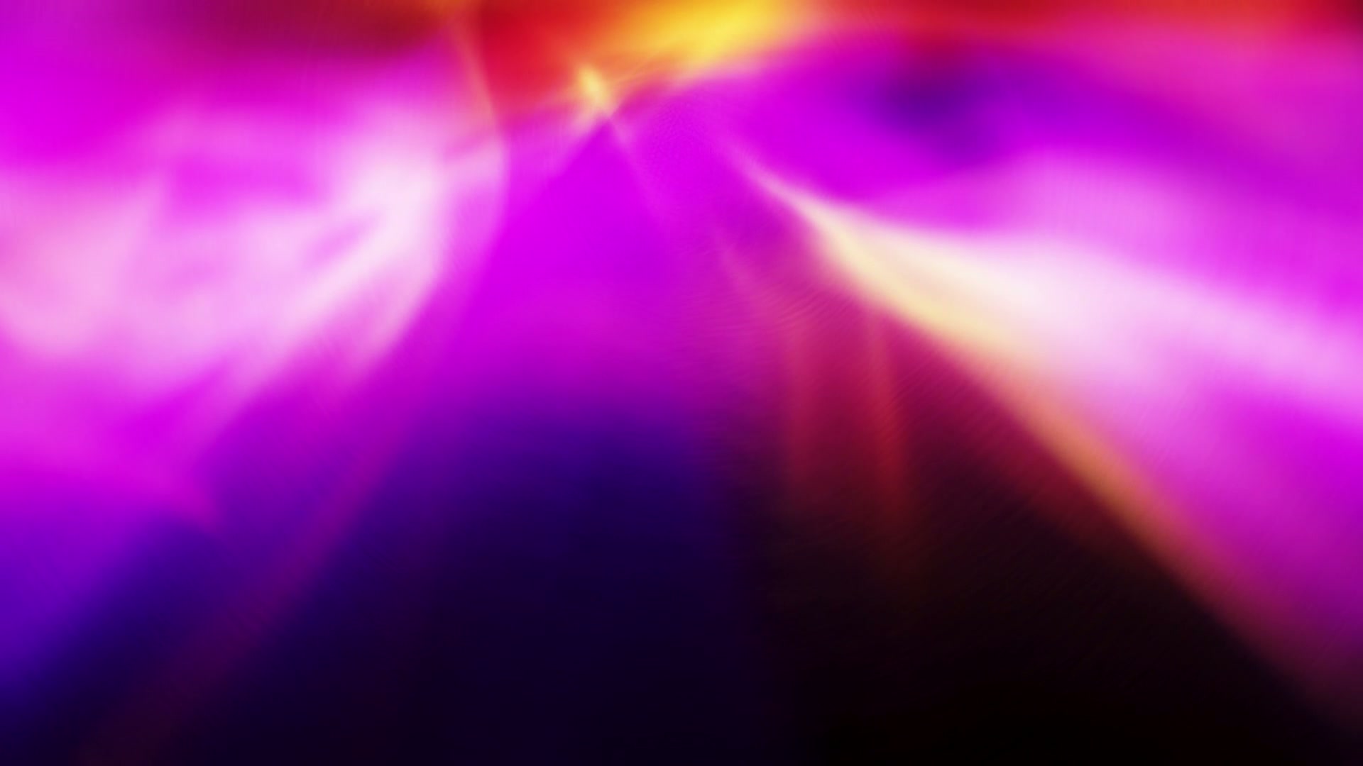 Abstract video loop animation with vibrant colors blending seamlessly, featuring dominant purples, pinks, and yellows, creating a dynamic and ethereal atmosphere.