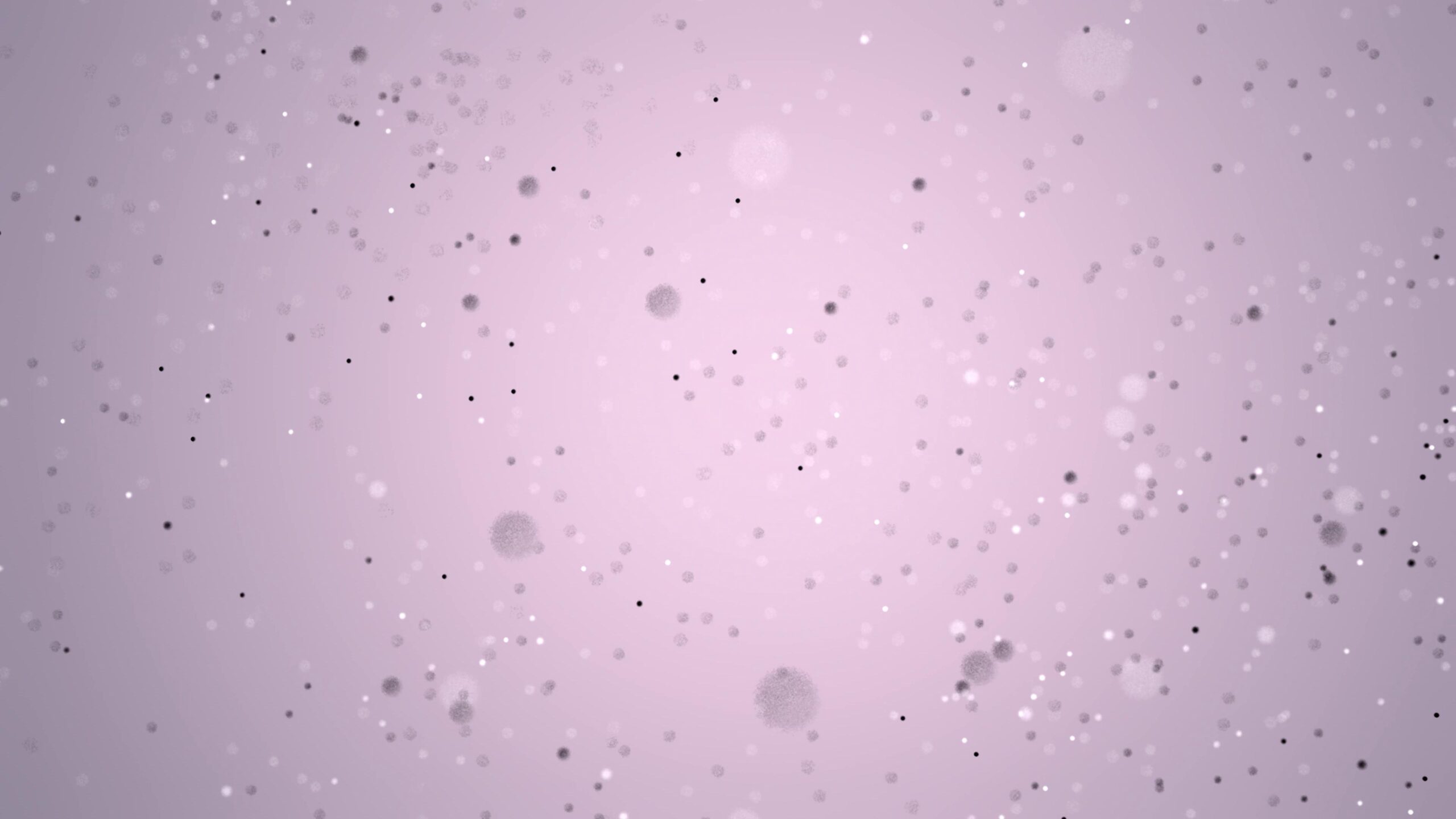 Soft purple video background animated by drifting glittery dots.