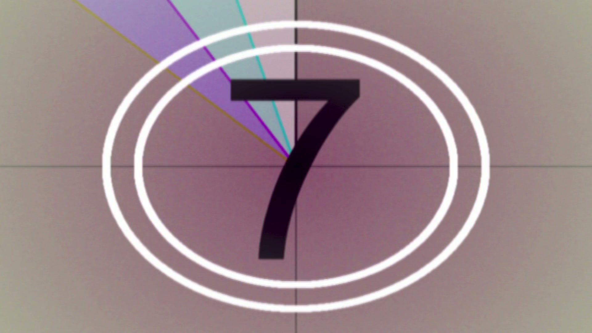 HD video of a vintage film countdown timer displaying the numbers within white concentric circles on a sepia-toned background.