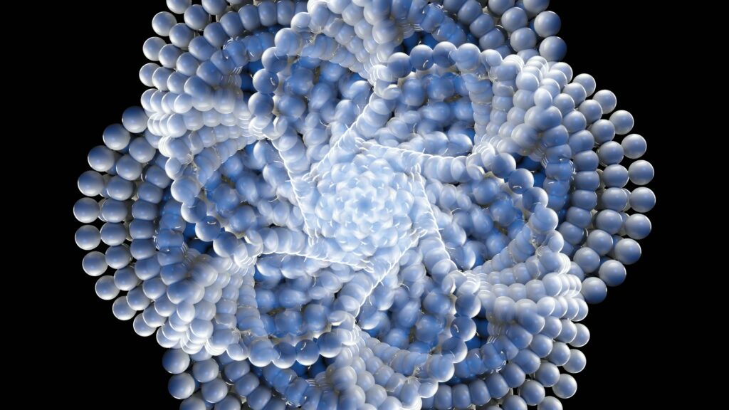 The flower of life sacred geometry structure made of blue and white spheres on a black background.