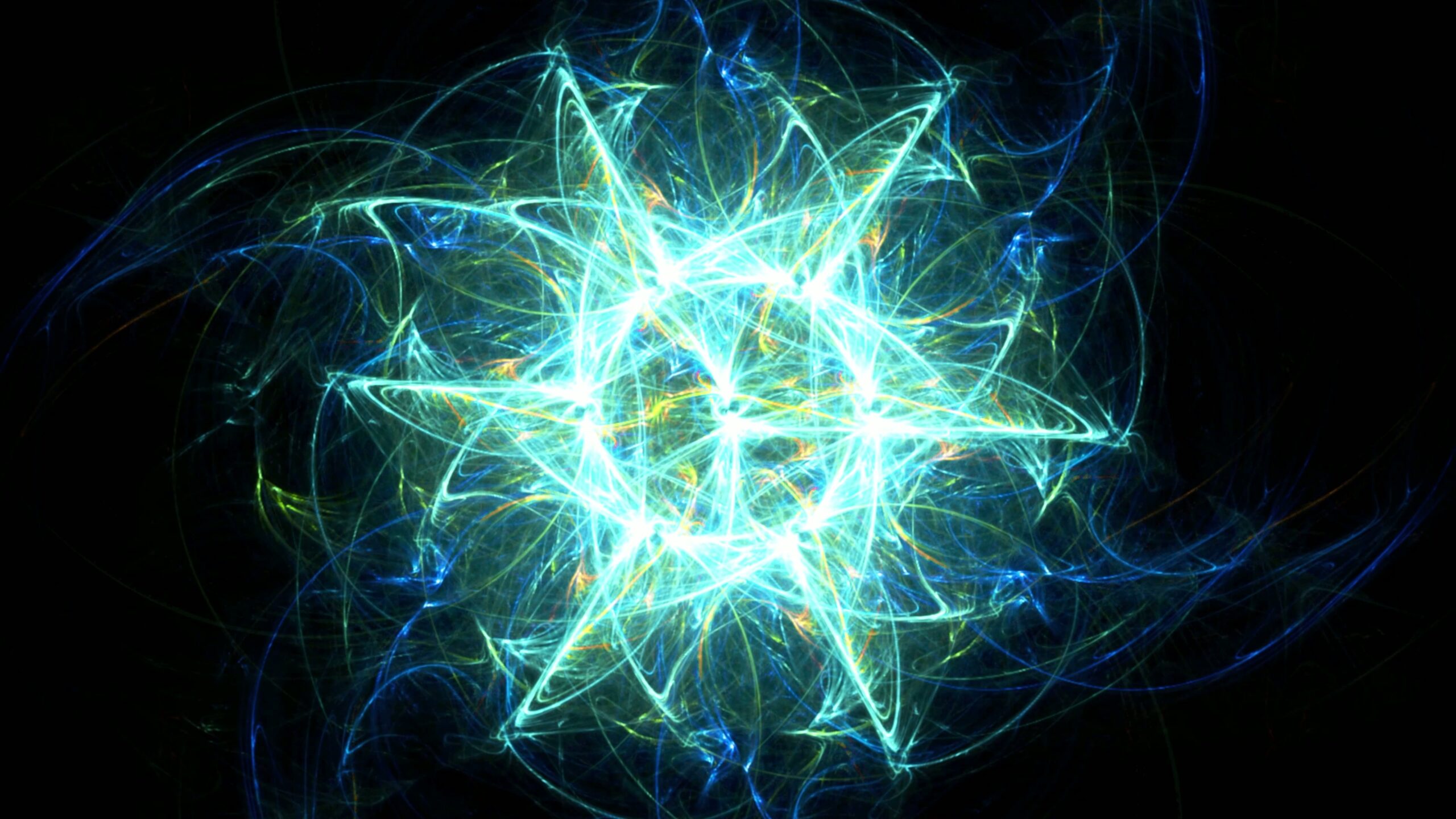 A glowing fractal starburst 4K animation loop in blue and green hues against a black background, showcasing intricate and radiant designs.