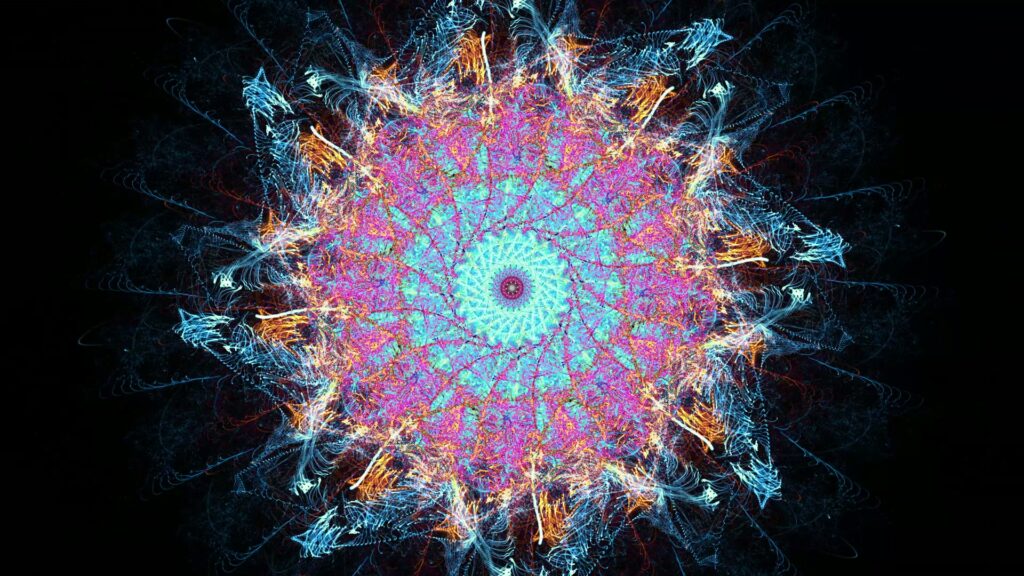 A vibrant and intricate fractal looping video with turquoise, pink, and blue hues, resembling an abstract energy burst against a dark background.