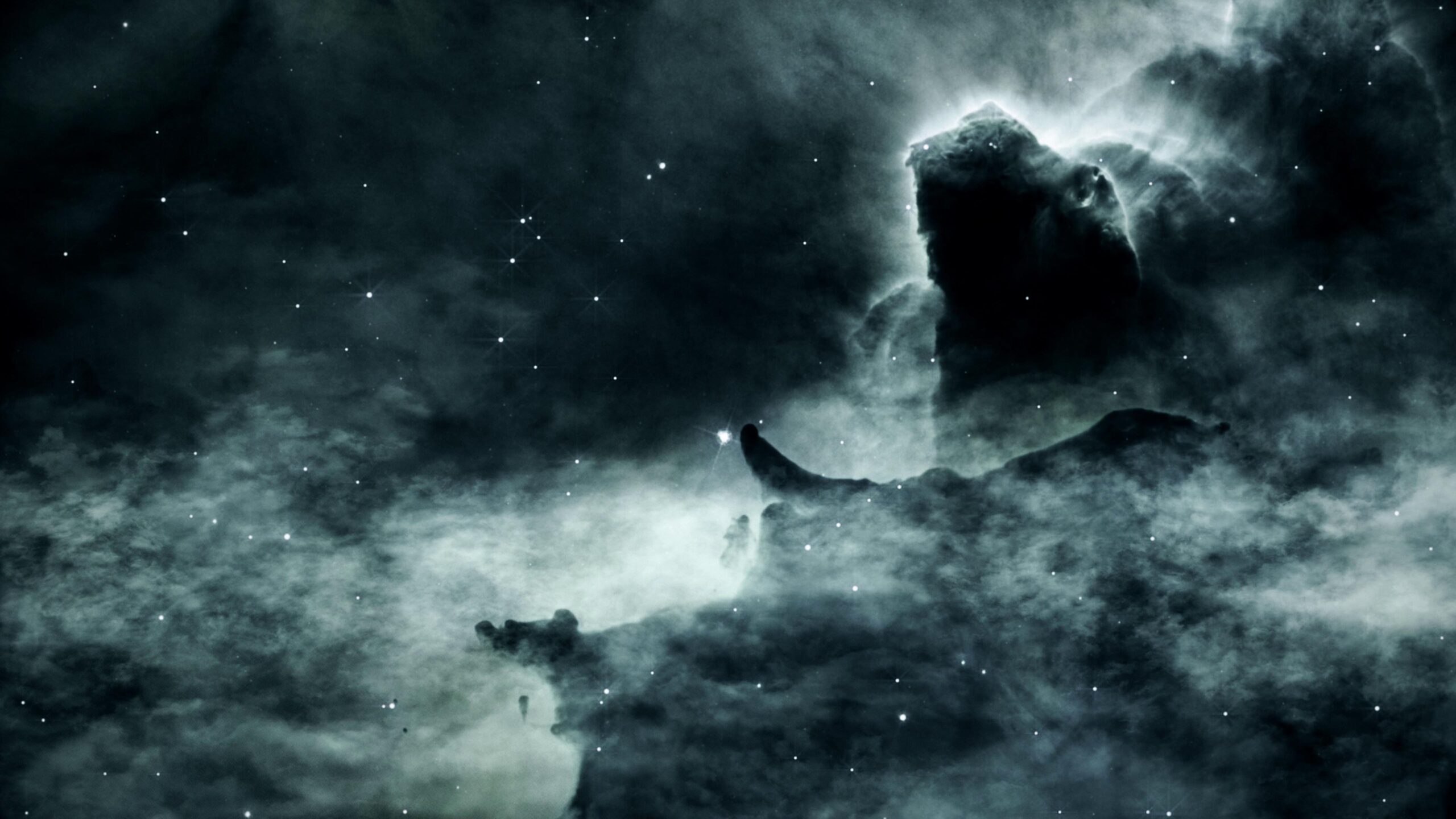 4K video of nebulae glow amidst twinkling stars under mysterious formations.