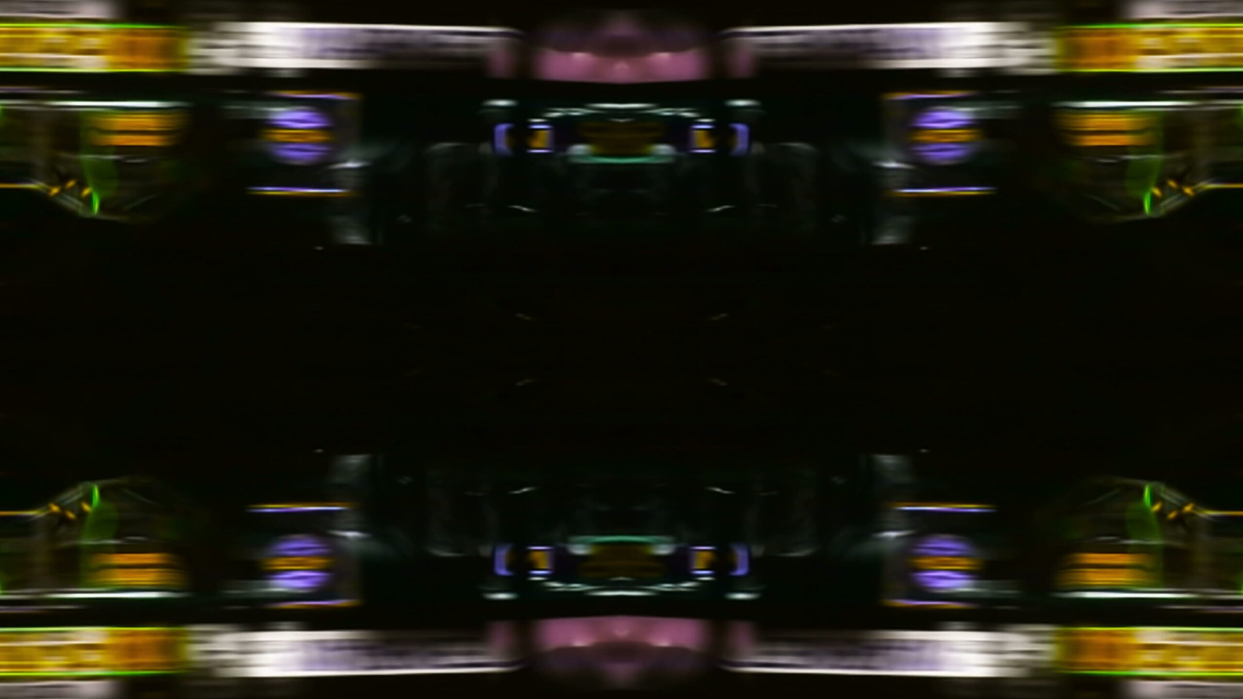 The 4K video loop features an abstract, symmetrical arrangement of neon lights create a vivid display as we travel through a futuristic cityscape.