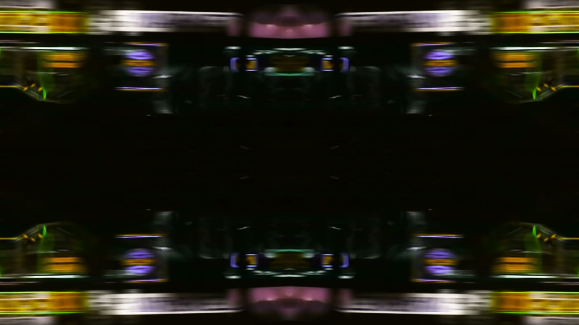 A symmetrical abstract video loop design with a mirrored effect. Dominated by dark tones and city lights.