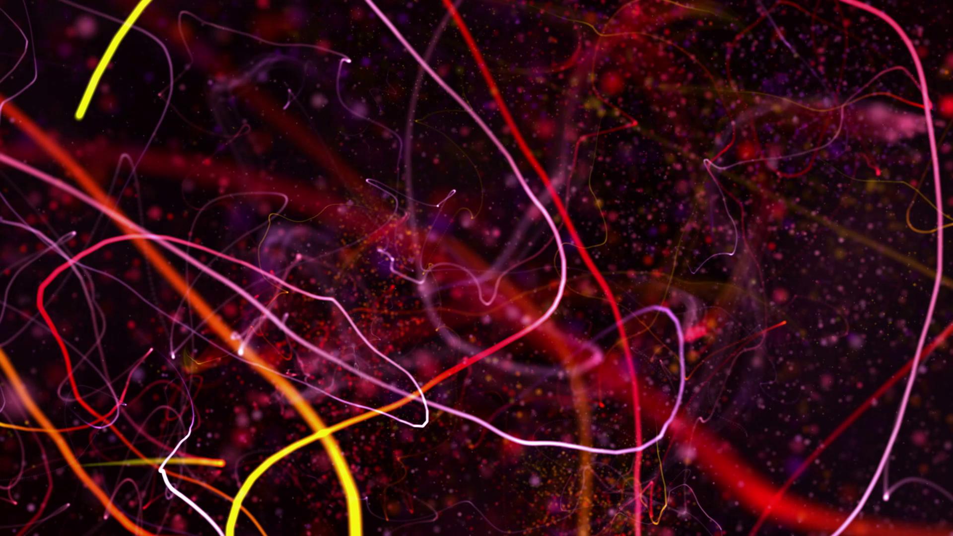Abstract colorful swirling lines against black video background animated effect.