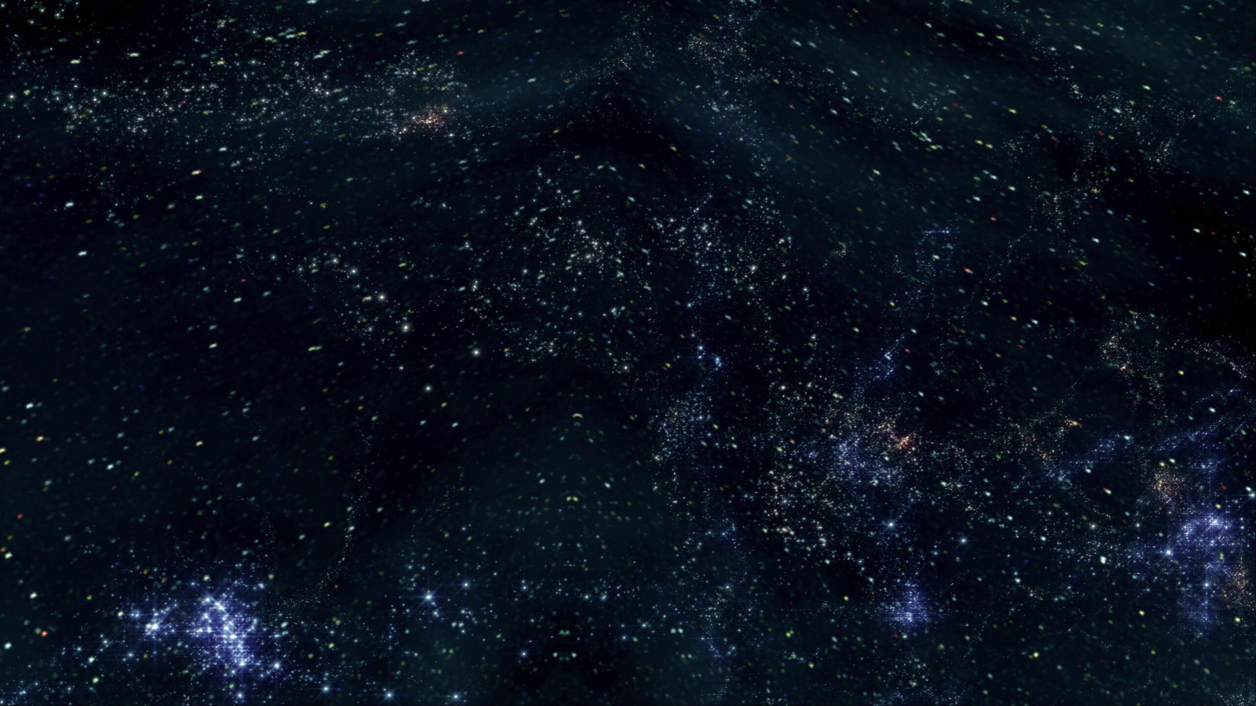4K video loop of a starry night sky with swirling nebulas and distant galaxy lights.