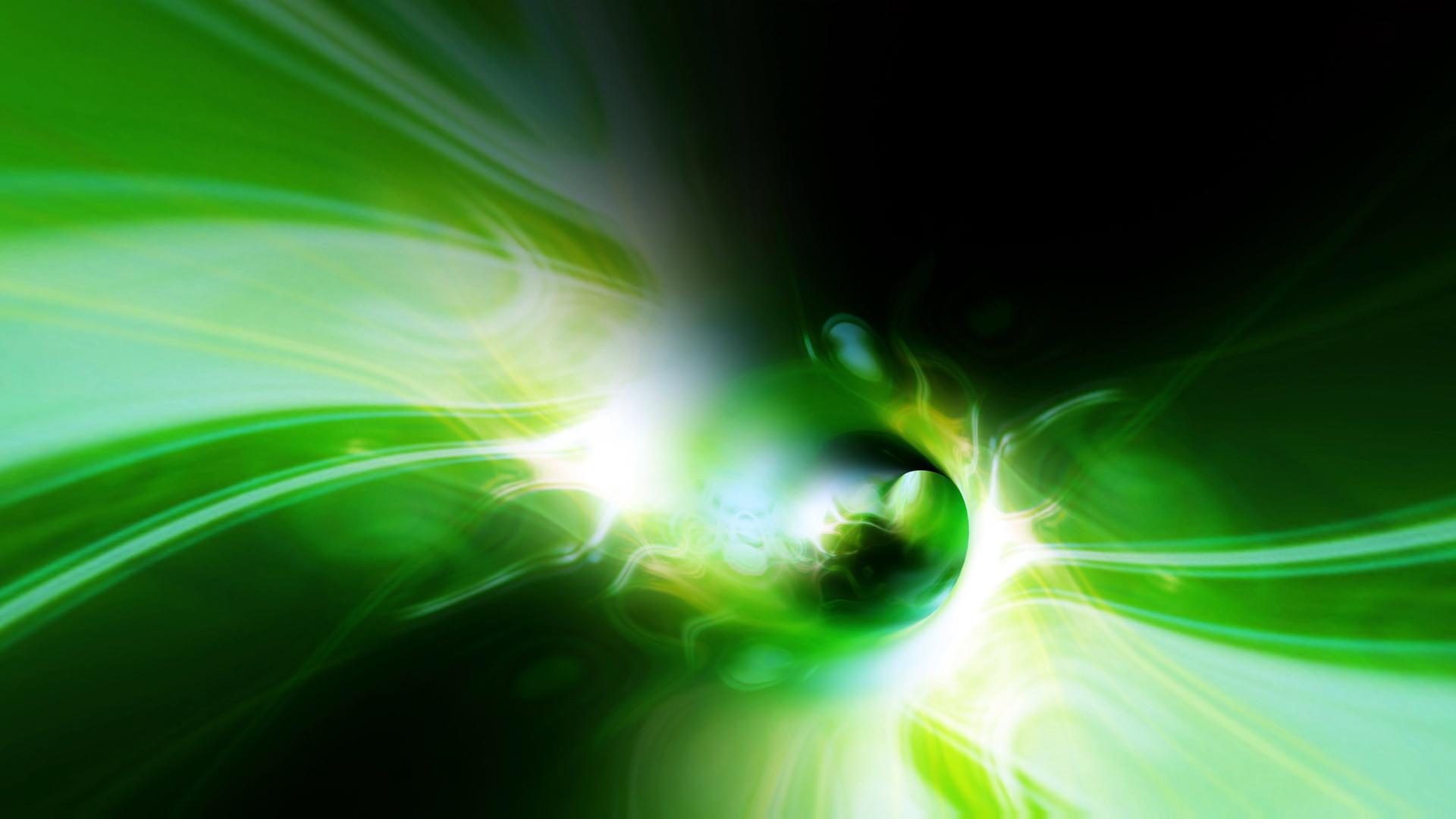 Free abstract glowing green swirling vortex video background animation.