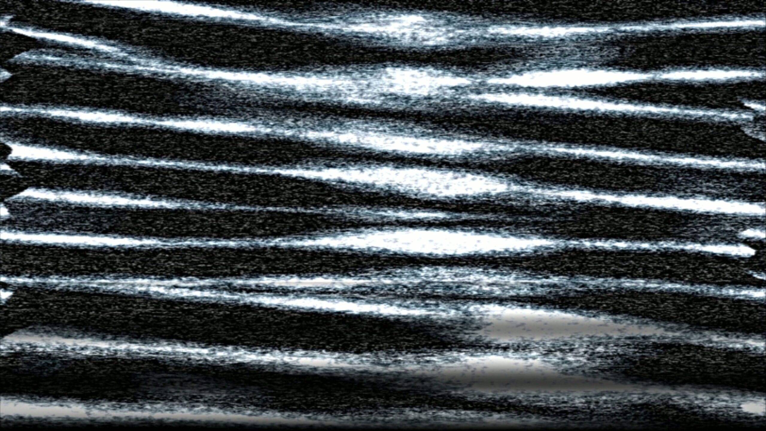 4K video loop of grainy black and white static on retro television screen depicting signal interference.