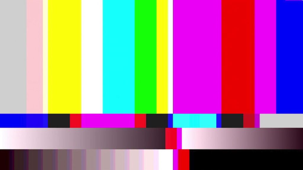 HD video loop of a classic television test pattern malfunction with vibrant vertical color bars and grayscale sections used for calibration and testing purposes.