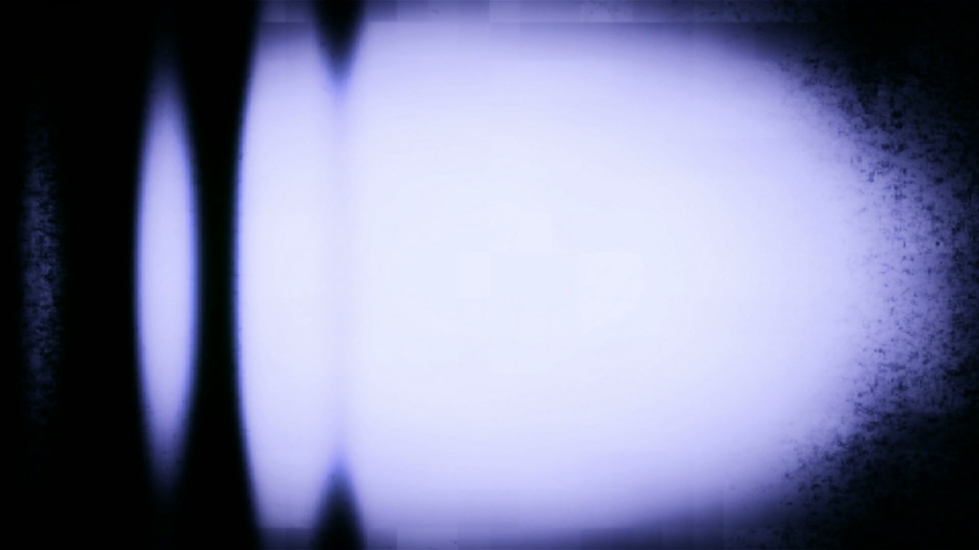 Abstract video loop of rolling TV static noise with glowing blue and white gradient and dark vignette edges.
