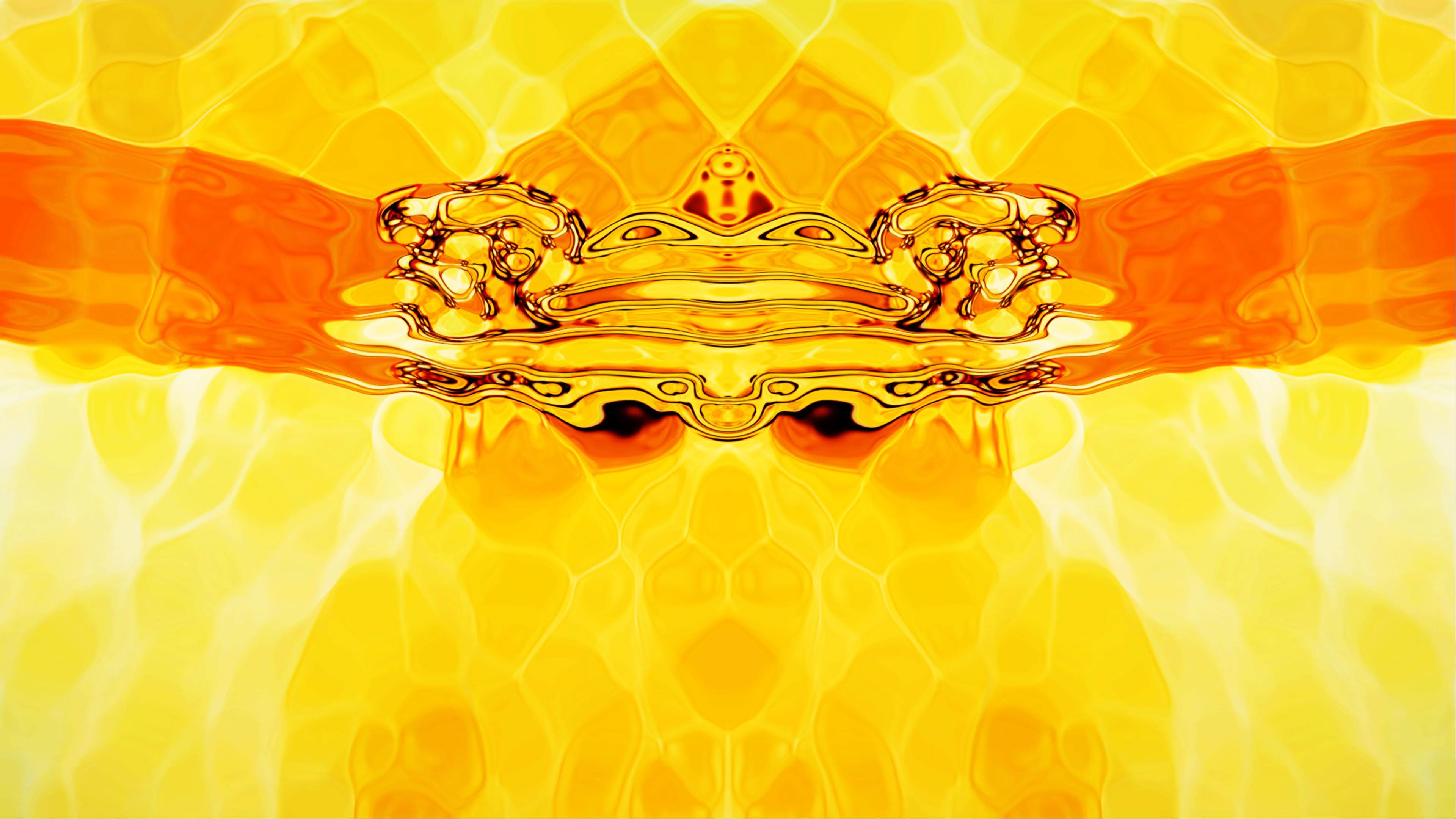 Abstract yellow and orange symmetrical artistic patterns with dynamic swirling designs and intricate organic shapes.