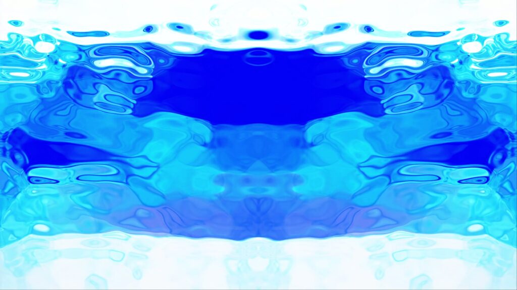 Abstract video loop featuring vibrant shades of blue and white, creating a symmetrical, fluid pattern reminiscent of waves or liquid, evoking a calming oceanic atmosphere.