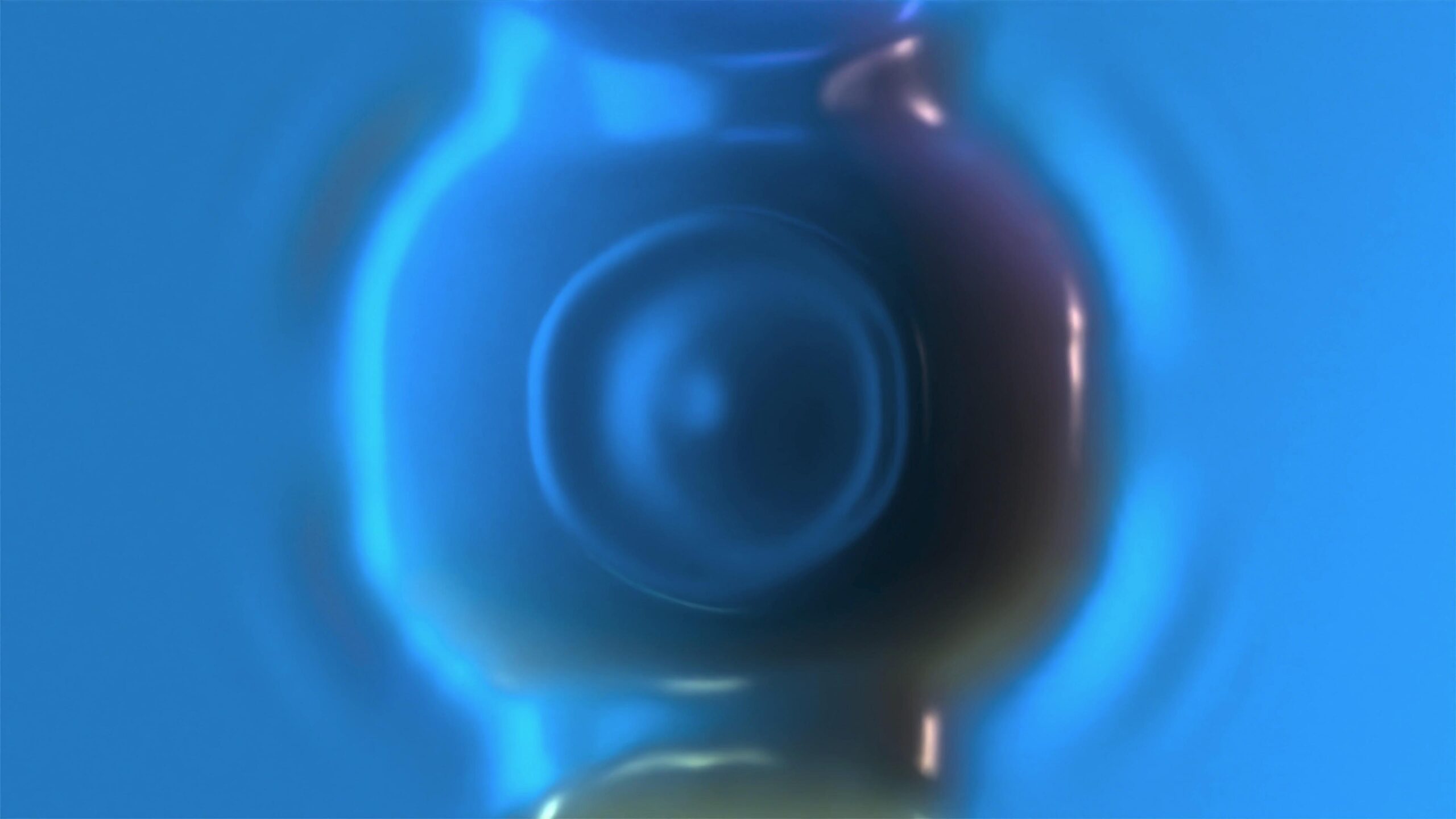 Abstract 4K looping video of a fluid metallic blue surface with reflections.