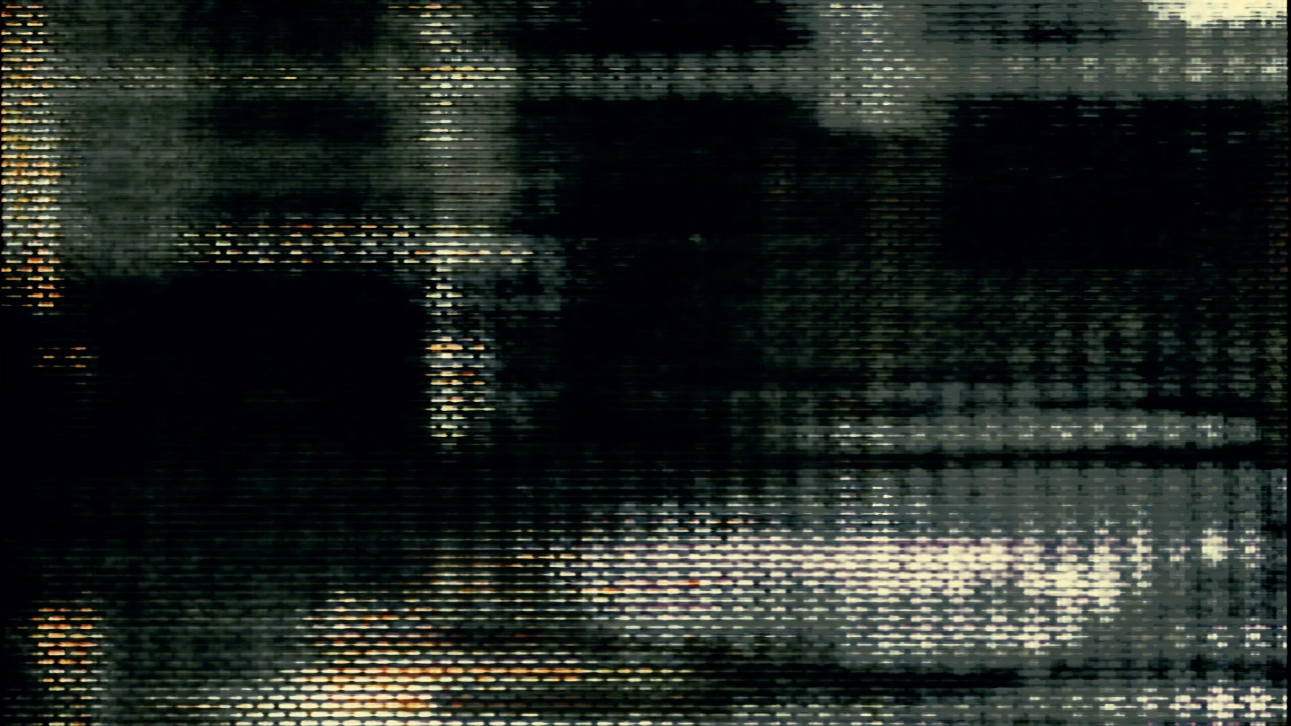 The 4K video loop depicts a digital distortion effect on what appears to be an old television screen or monitor with pixelated and glitched visuals that suggest signal interference or damage.