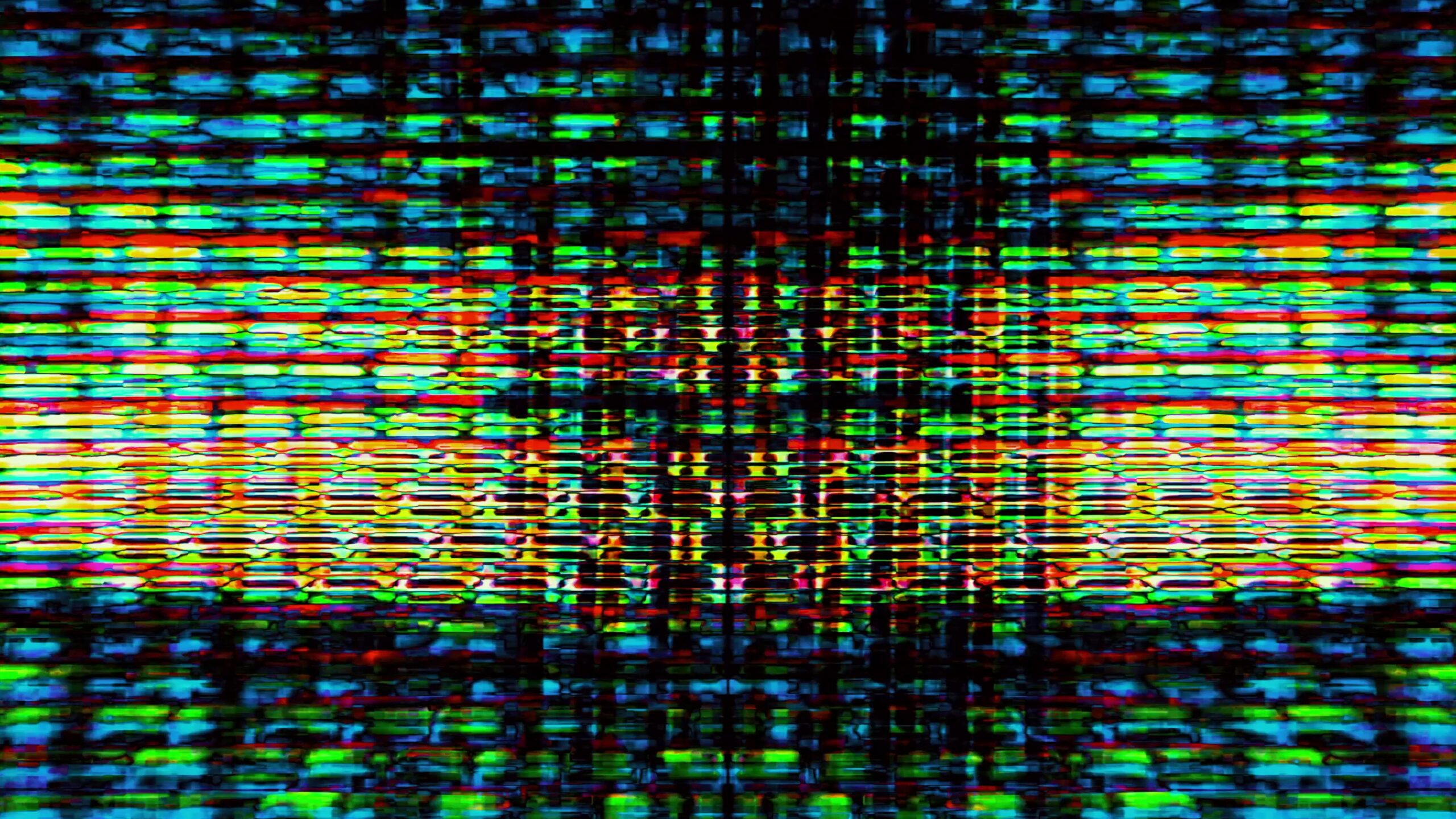 Colorful LED grid pulses rhythmically on reflective surface.