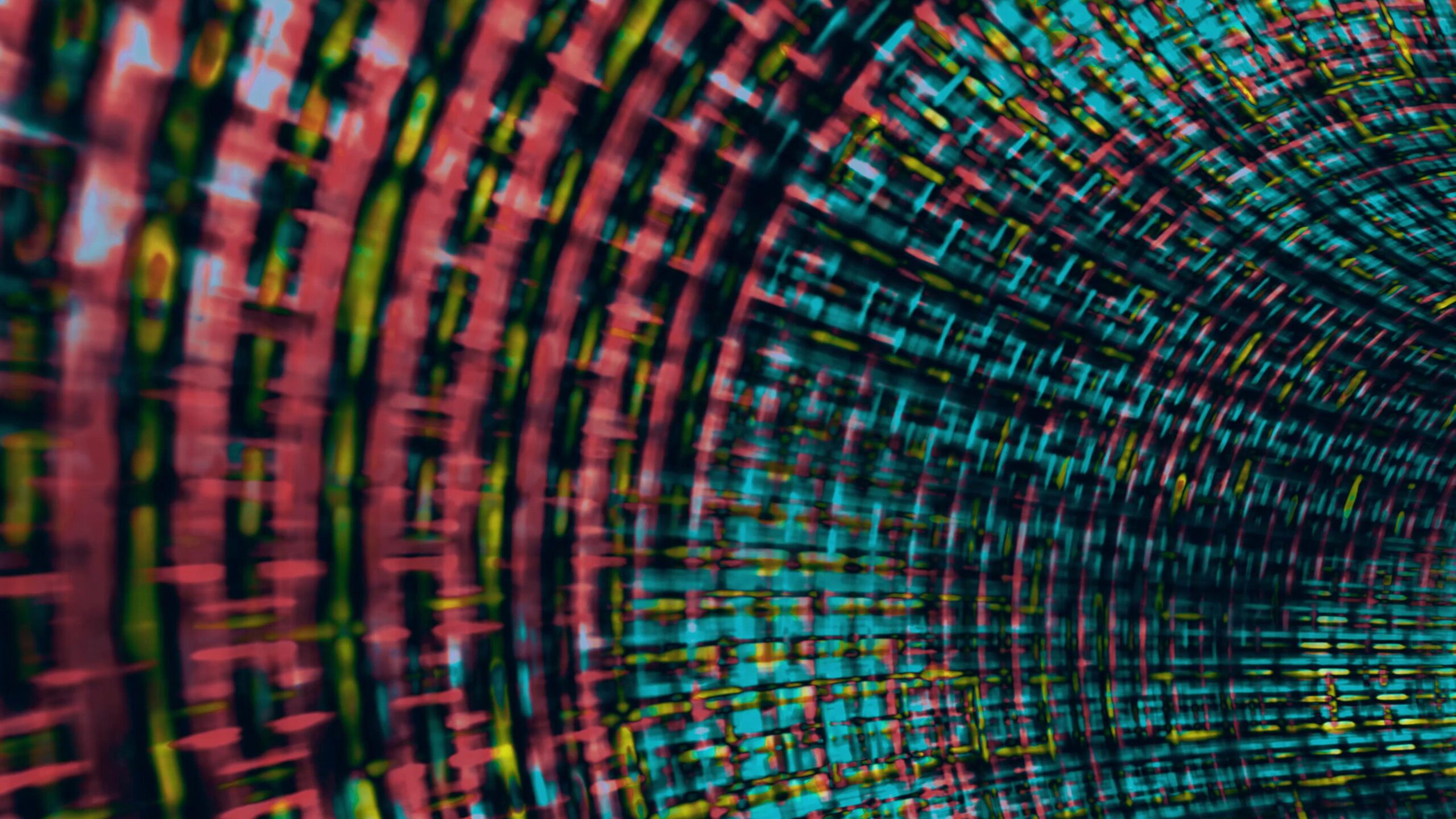 A swirling, colorful digital tunnel made from dynamic grid-like patterns shifts vividly with glowing neon hues.