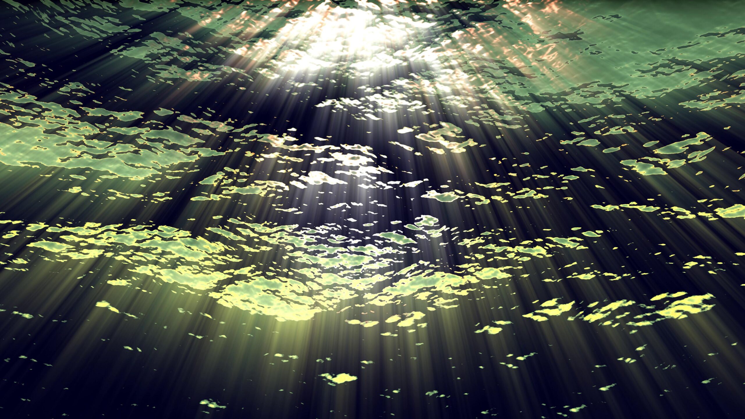 4K video loop of underwater sunrays illuminating deep waters.