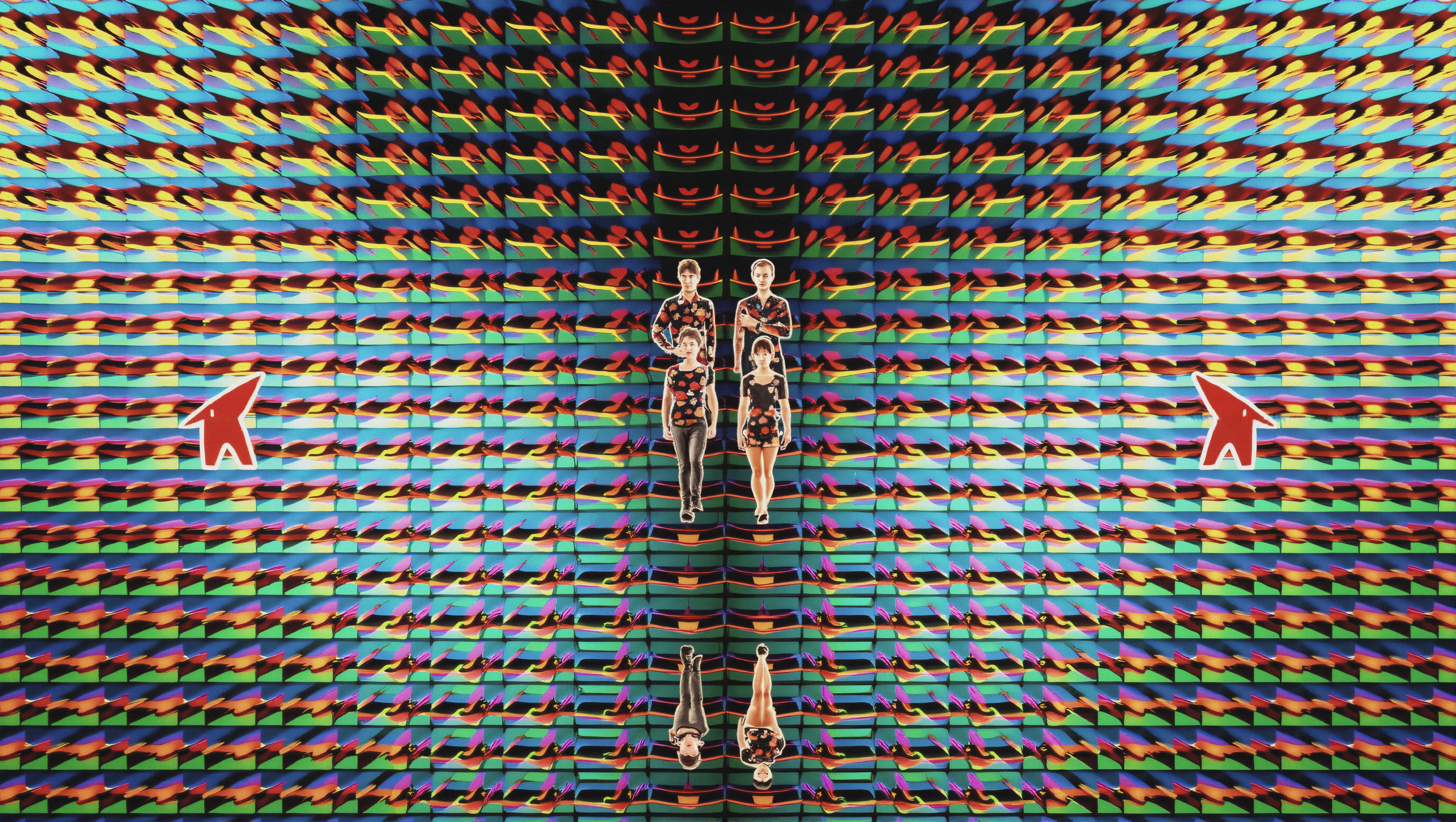 Colorful patterned background with mirrored people.