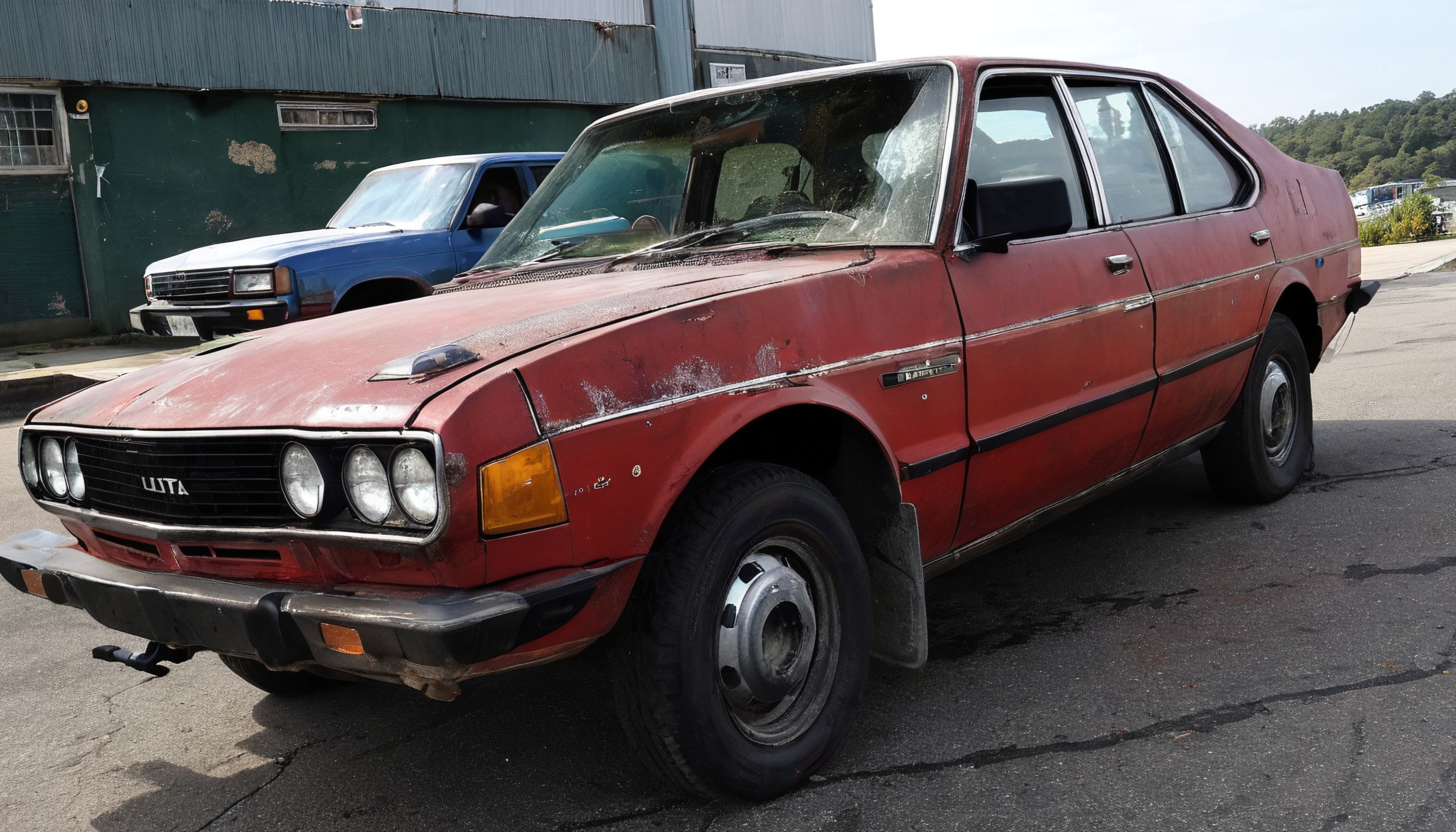 Red Vintage Sedan on Street