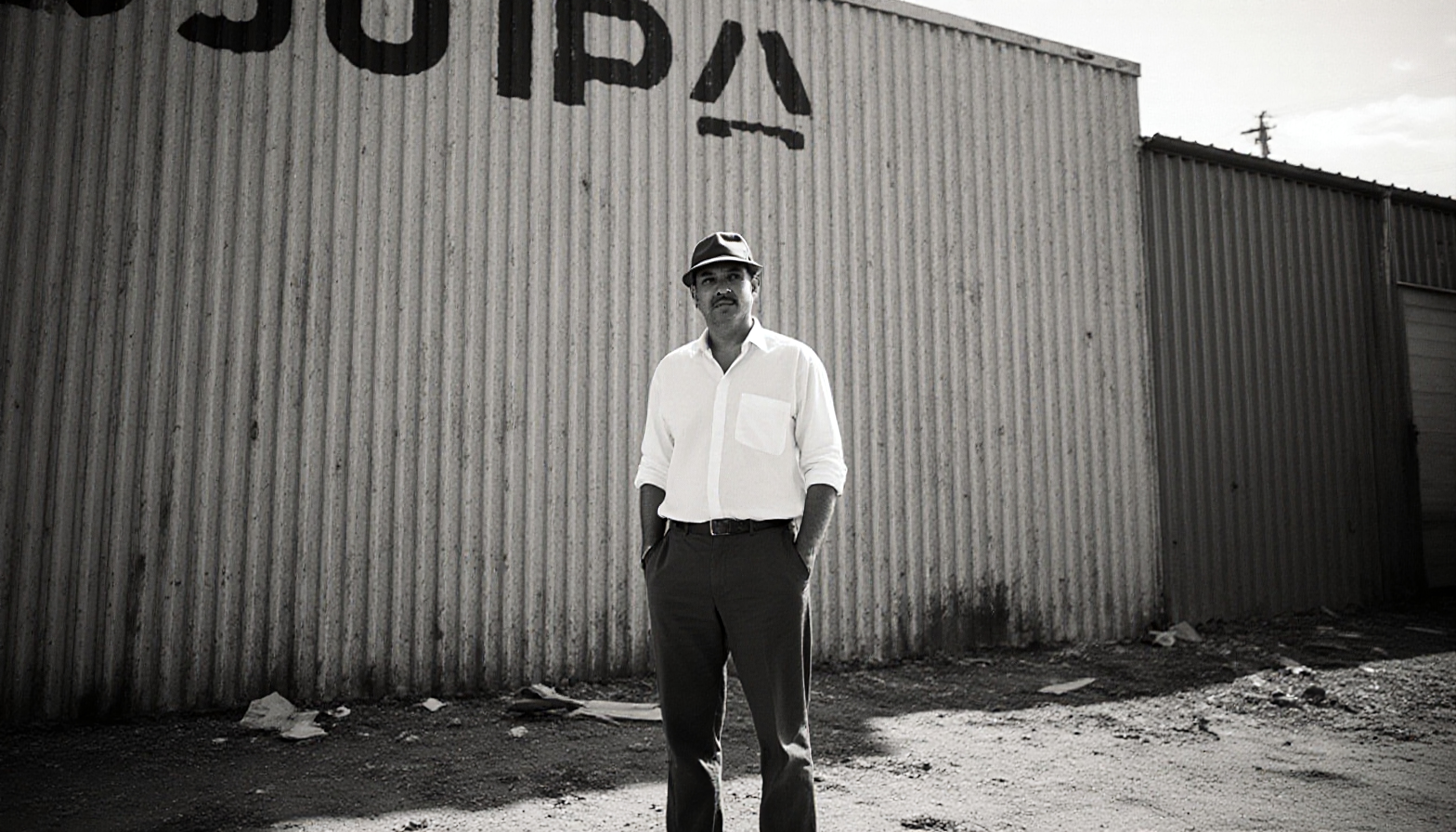 Vintage Man in Industrial Setting